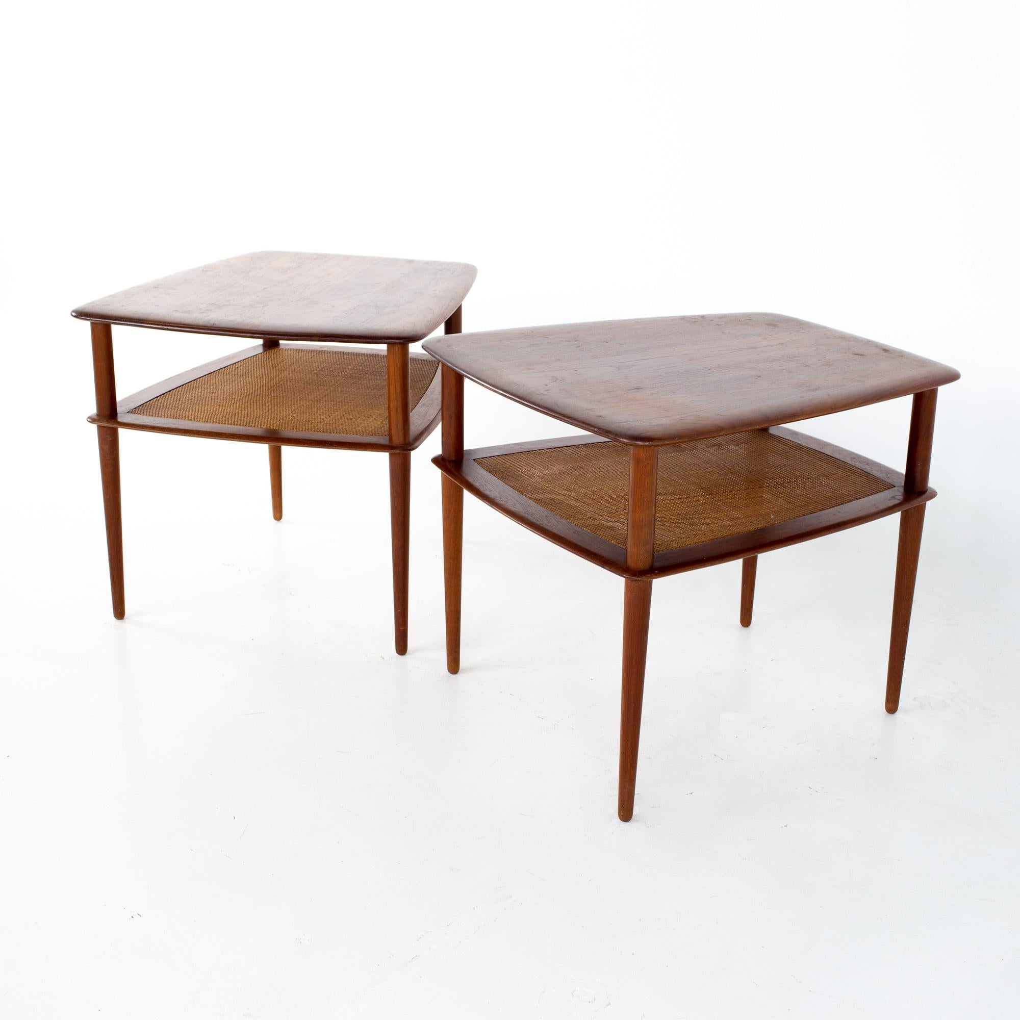 Peter Hvidt for France and Sons mid century teak and cane side end tables - a pair
End table measures: 25 wide x 27.5 deep x 22.75 inches high 

All pieces of furniture can be had in what we call restored vintage condition. That means the piece