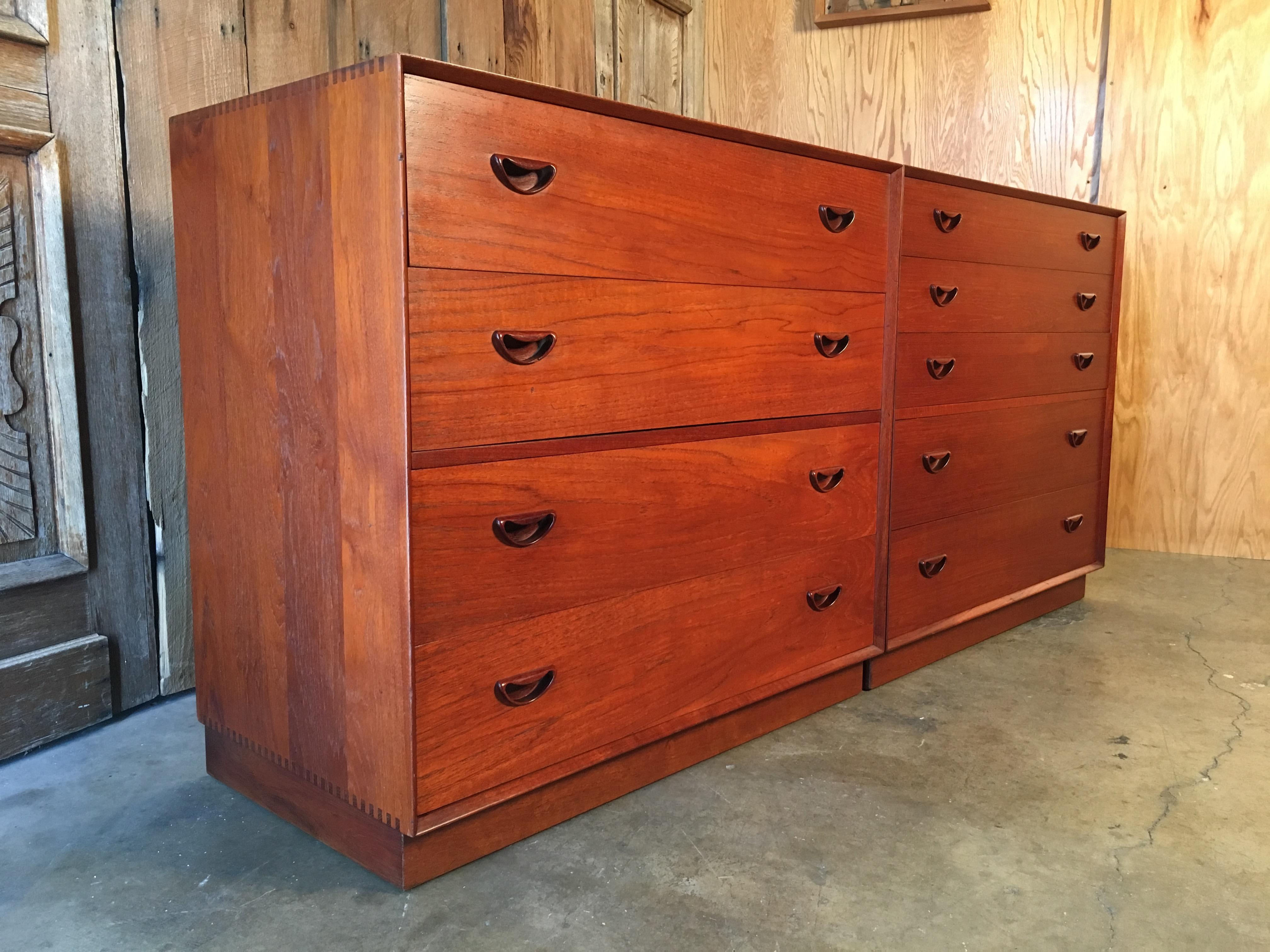 Solid teak Danish modern dressers with dovetailed drawers and box joint corners on the case 
Also one cabinet contains a pullout mirror with small interior drawers.