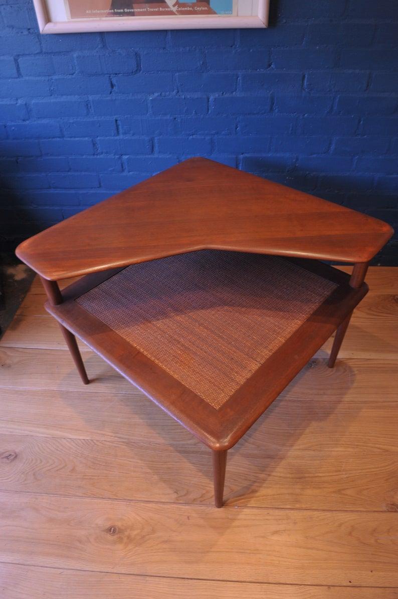 Peter Hvidt & Orla Mølgaard Nielsen for France & Son Minerva range Teak & Rattan two Tier Coffee Table.
Iconic Mid-Century Modern Danish Coffee Table. Table is labelled with France & Son manufacturers mark.
About: Peter Hvidt (1916–1986) was a