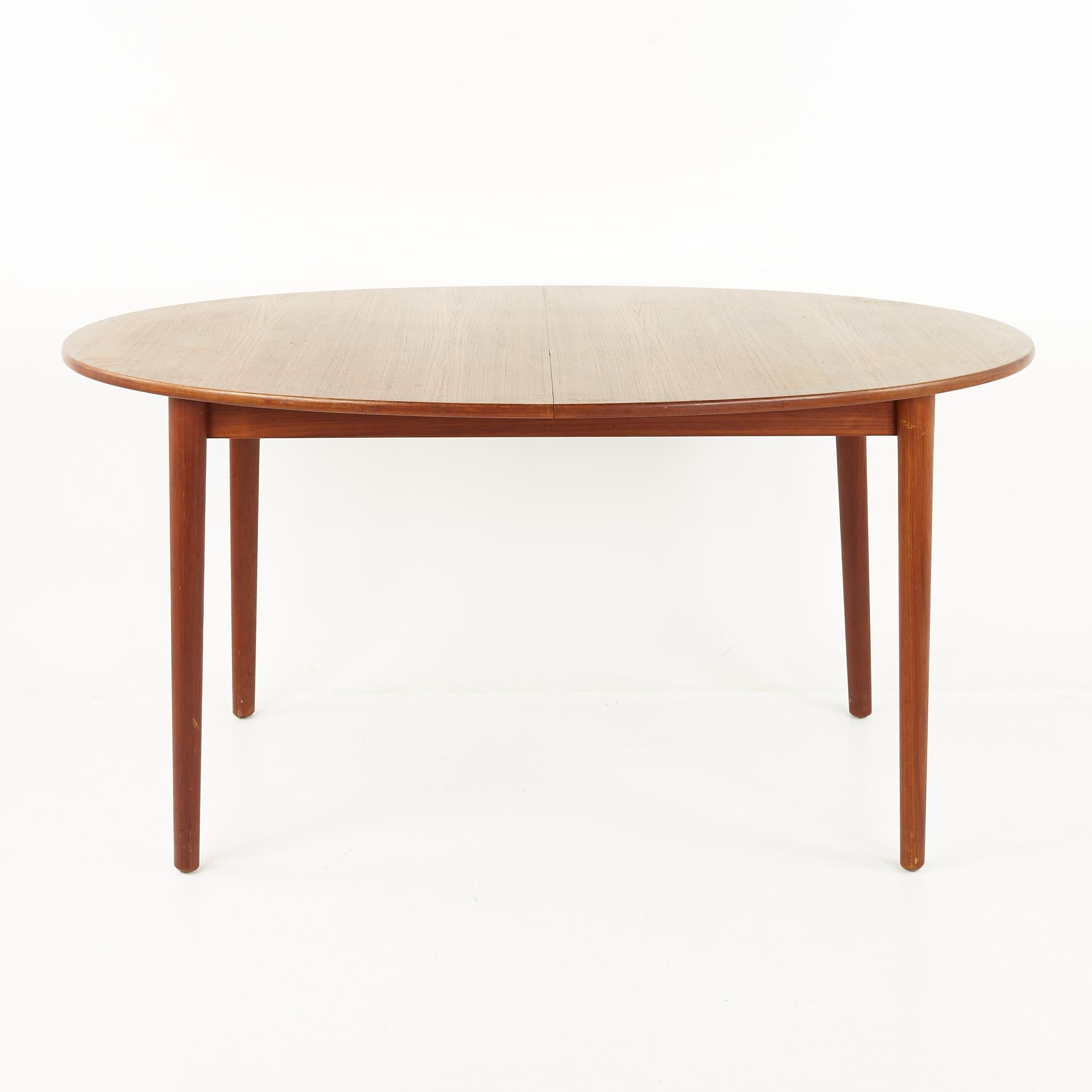 Peter Hvidt mid century dining table with 2 leaves

This table measures: 60 wide x 40 deep x 29 inches high, each of the 2 leaves are 12 inches wide, making a maximum table width of 84 inches

All pieces of furniture can be had in what we call