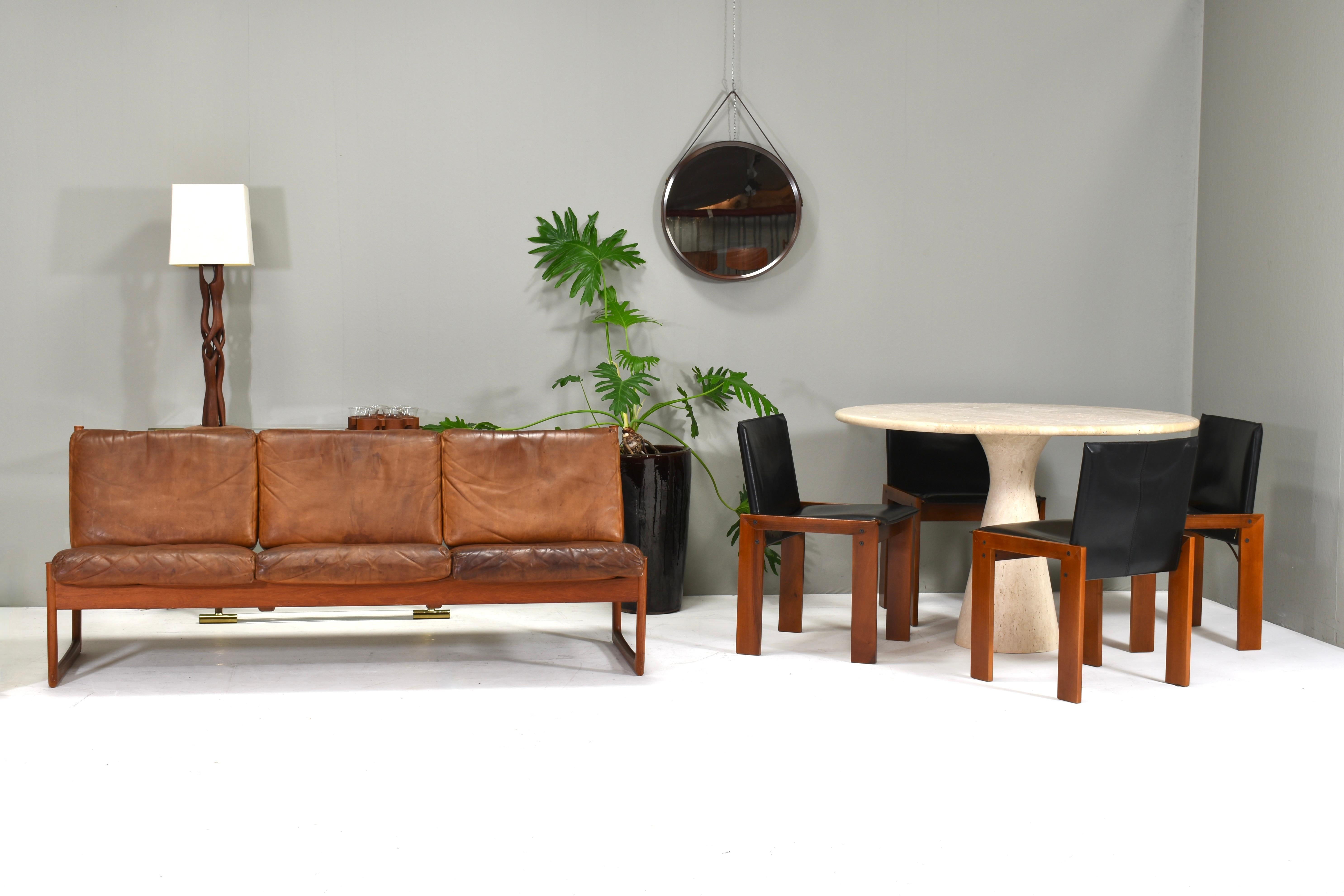 Amazing minimalistic solid Teak and Cognac leather sofa model FD130 by Peter Hvidt & Orla Mølgaard-Nielsen for France and Søn – Denmark, circa 1960. The leather has a lot of patina and character. 

Designer: Peter Hvidt & Orla