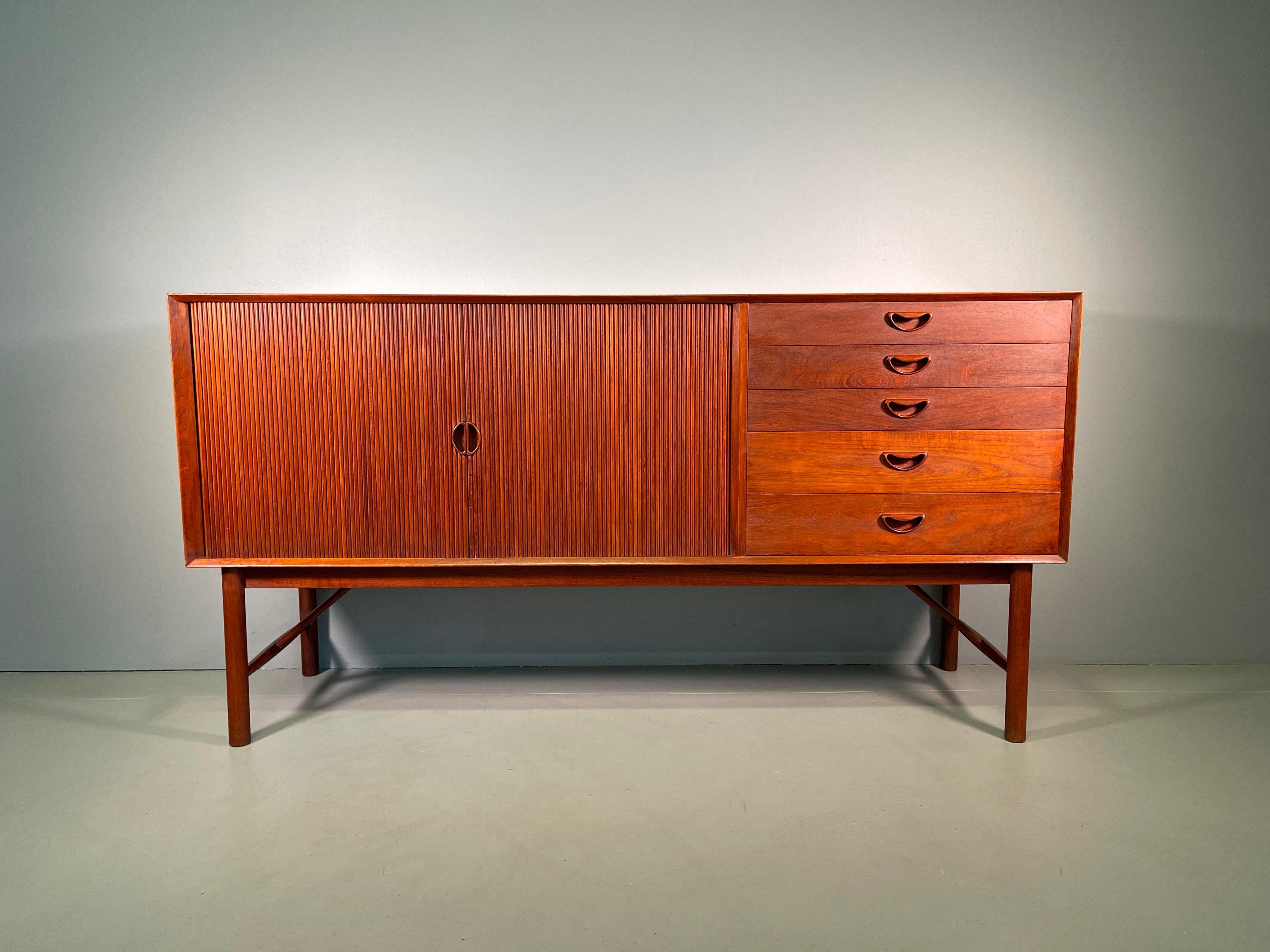 Peter Hvidt & Orla Mølgaard Nielsen design teak credenza, Denmark. 
High quality construction and attention to detail with dovetail construction in solid teak.