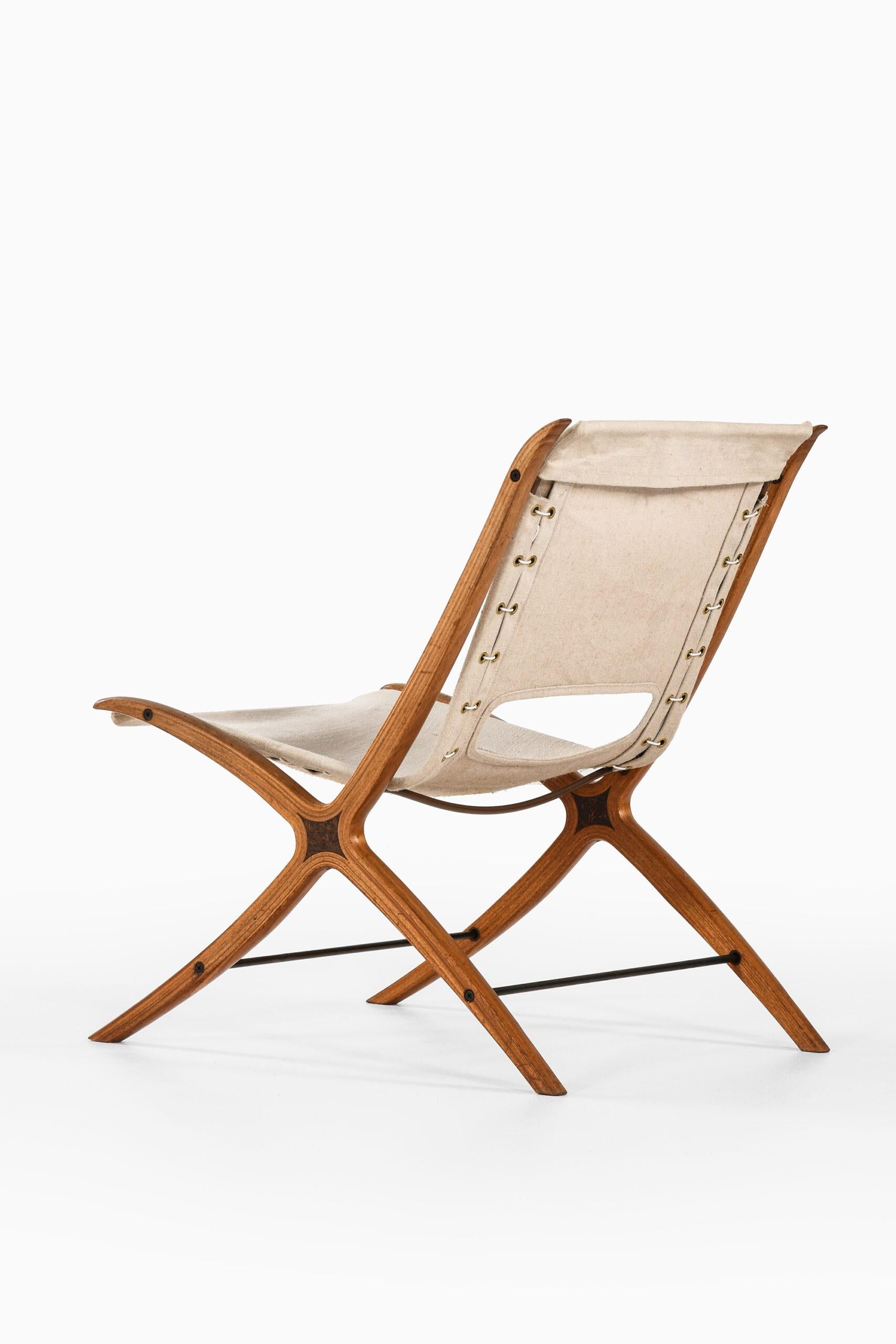Danish Peter Hvidt & Orla Mølgaard-Nielsen Easy Chair Model X-Chair / FH-6135 For Sale