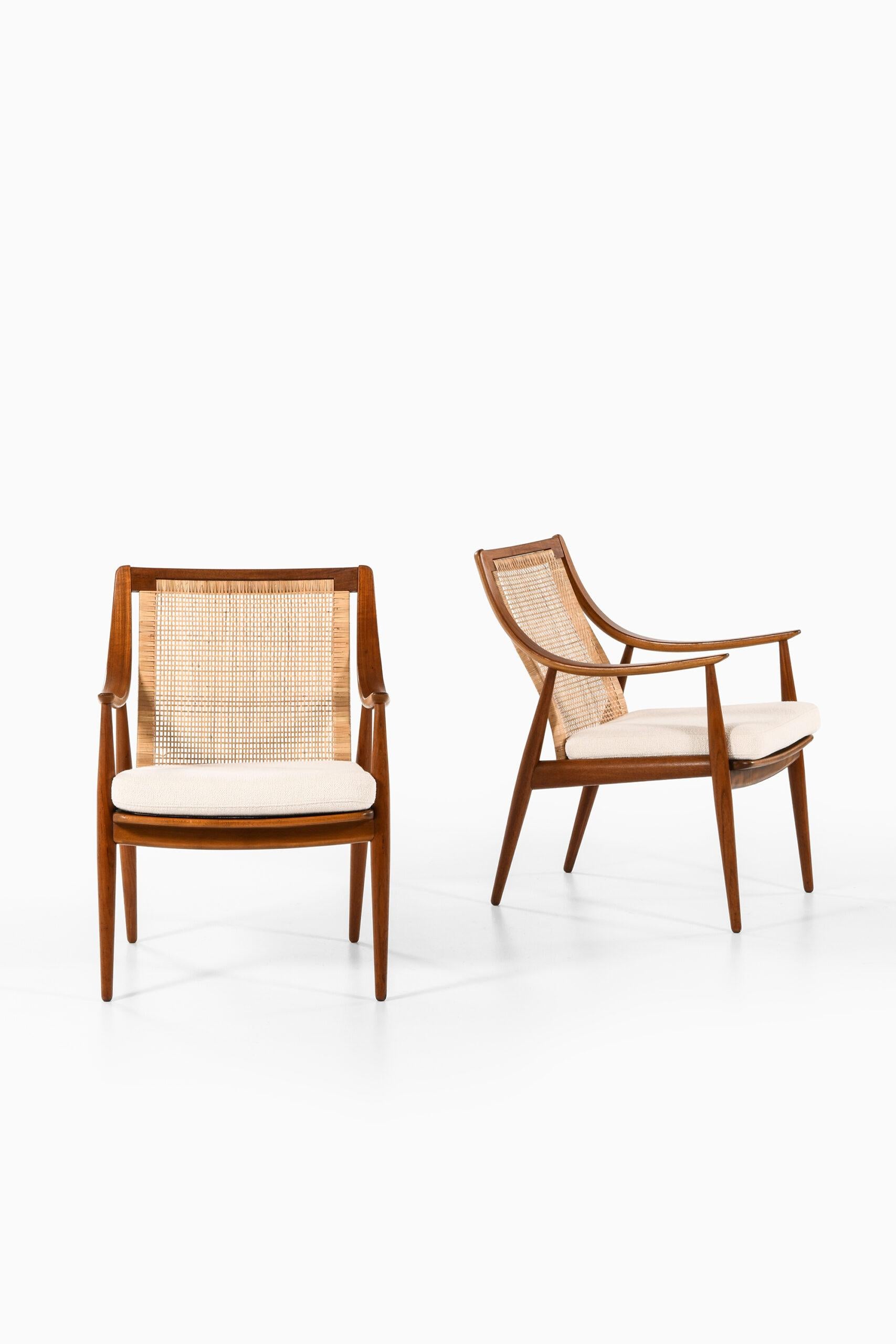 Rare pair of easy chairs model 146 designed by Peter Hvidt & Orla Mølgaard-Nielsen. Produced by France & Son in Denmark.