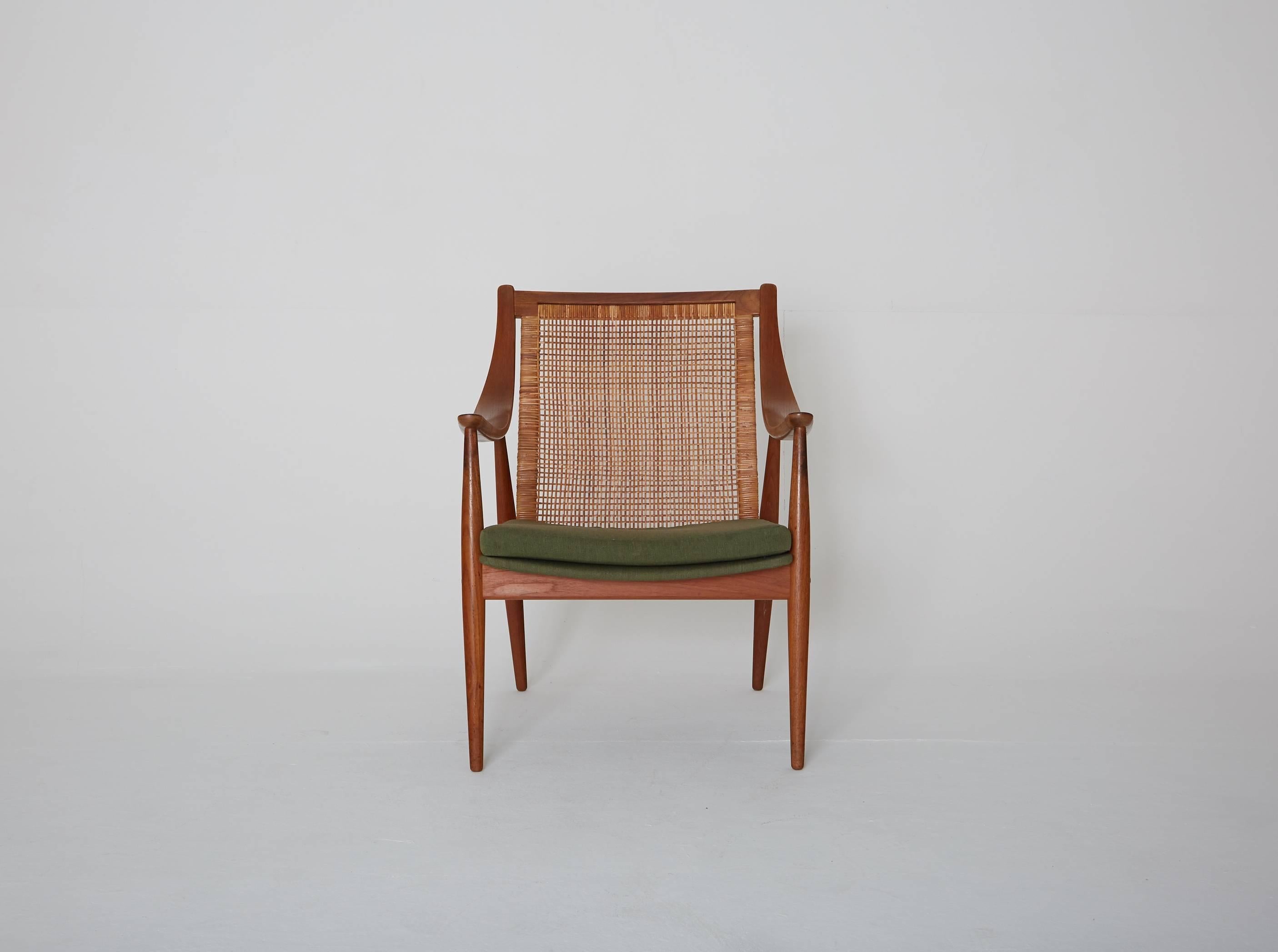 A rare Peter Hvidt & Orla Mølgaard-Nielsen FD 146 chair, Denmark, 1950s with original green fabric seat.