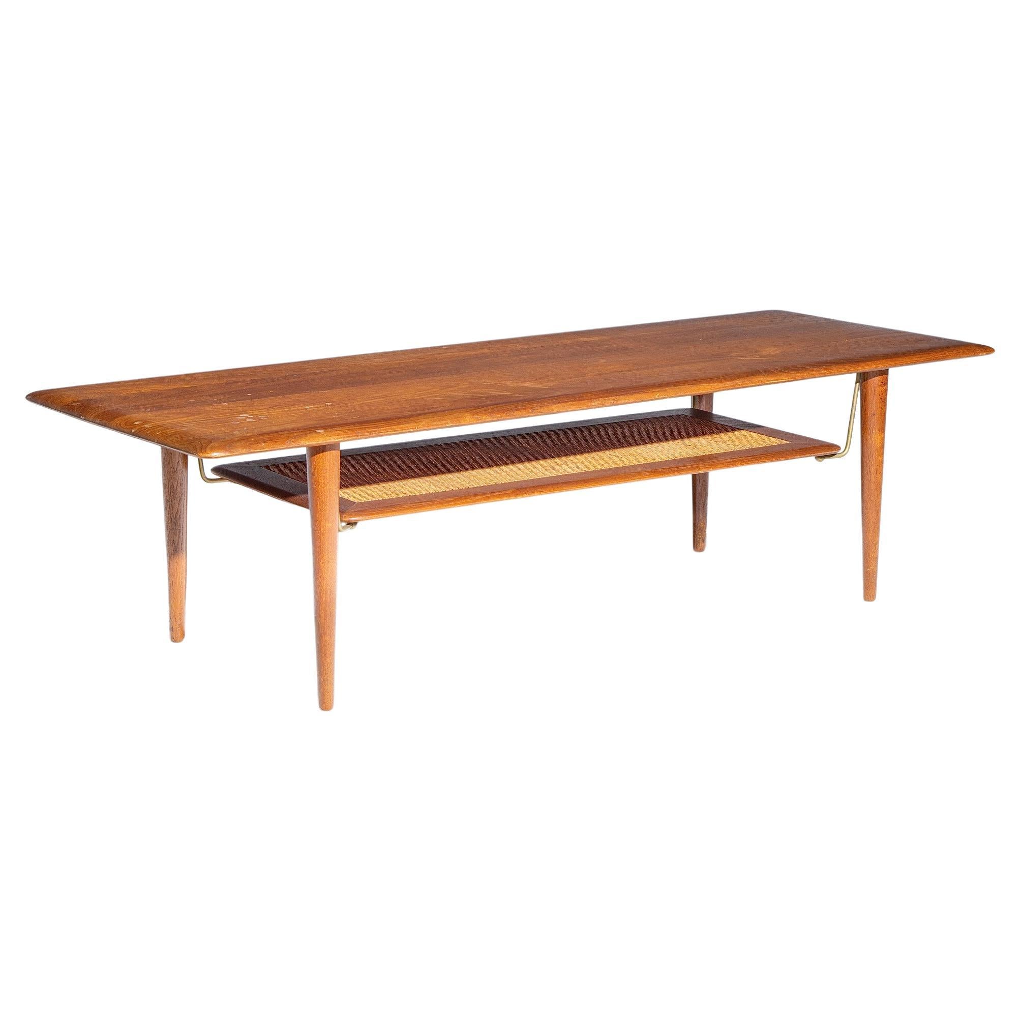 Peter Hvidt/Orla Mølgaard Nielsen for France
Son Teak Cane Brass Coffee Table