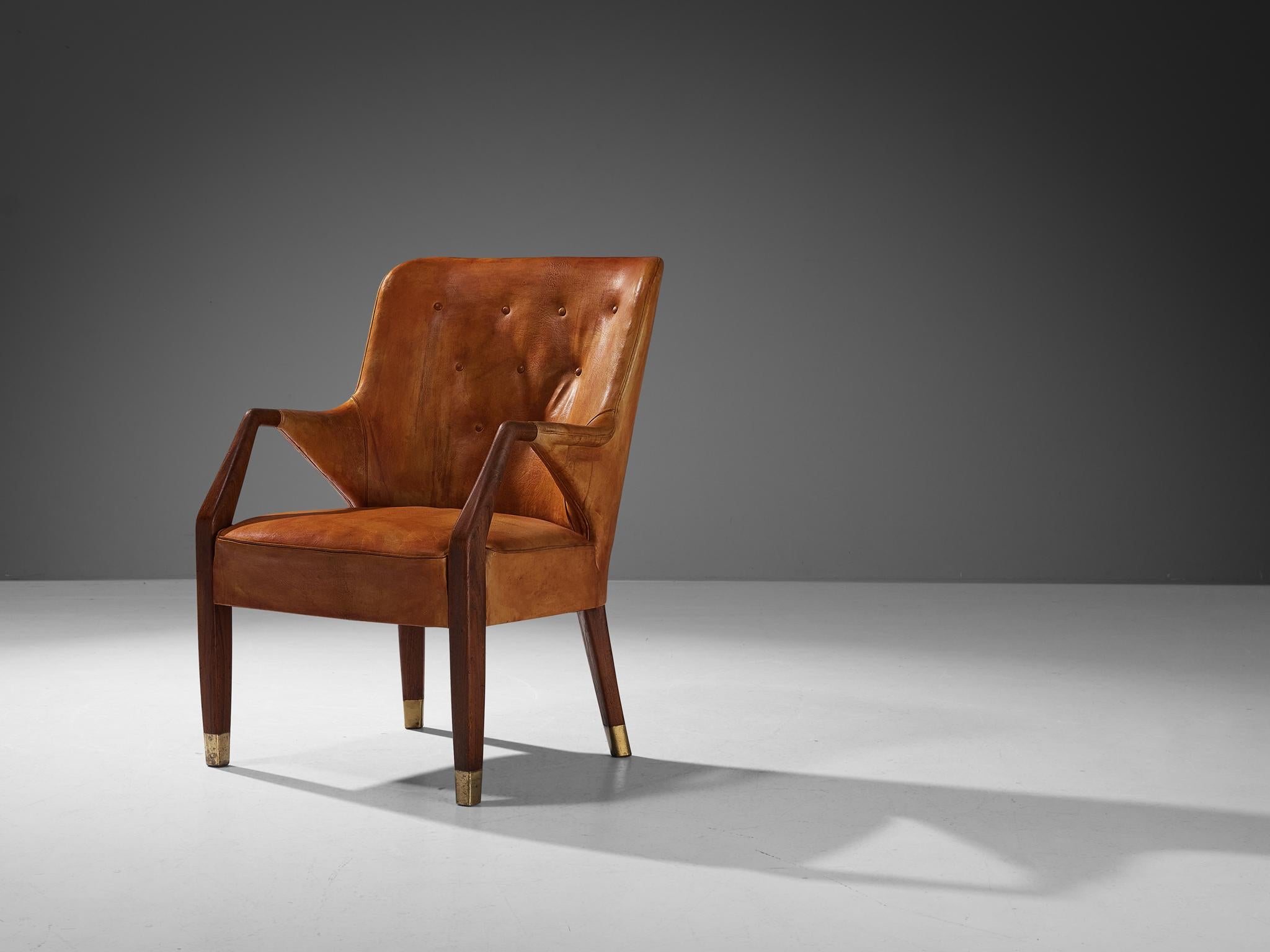 Peter Hvidt & Orla Mølgaard-Nielsen pour Gustav Bertelsen, fauteuil, teck, cuir niger, laiton, Danemark, conçu en 1948 et fabriqué à la fin des années 1940.

Chaise longue au design précoce, créée par le duo de designers danois Peter Hvidt et Orla