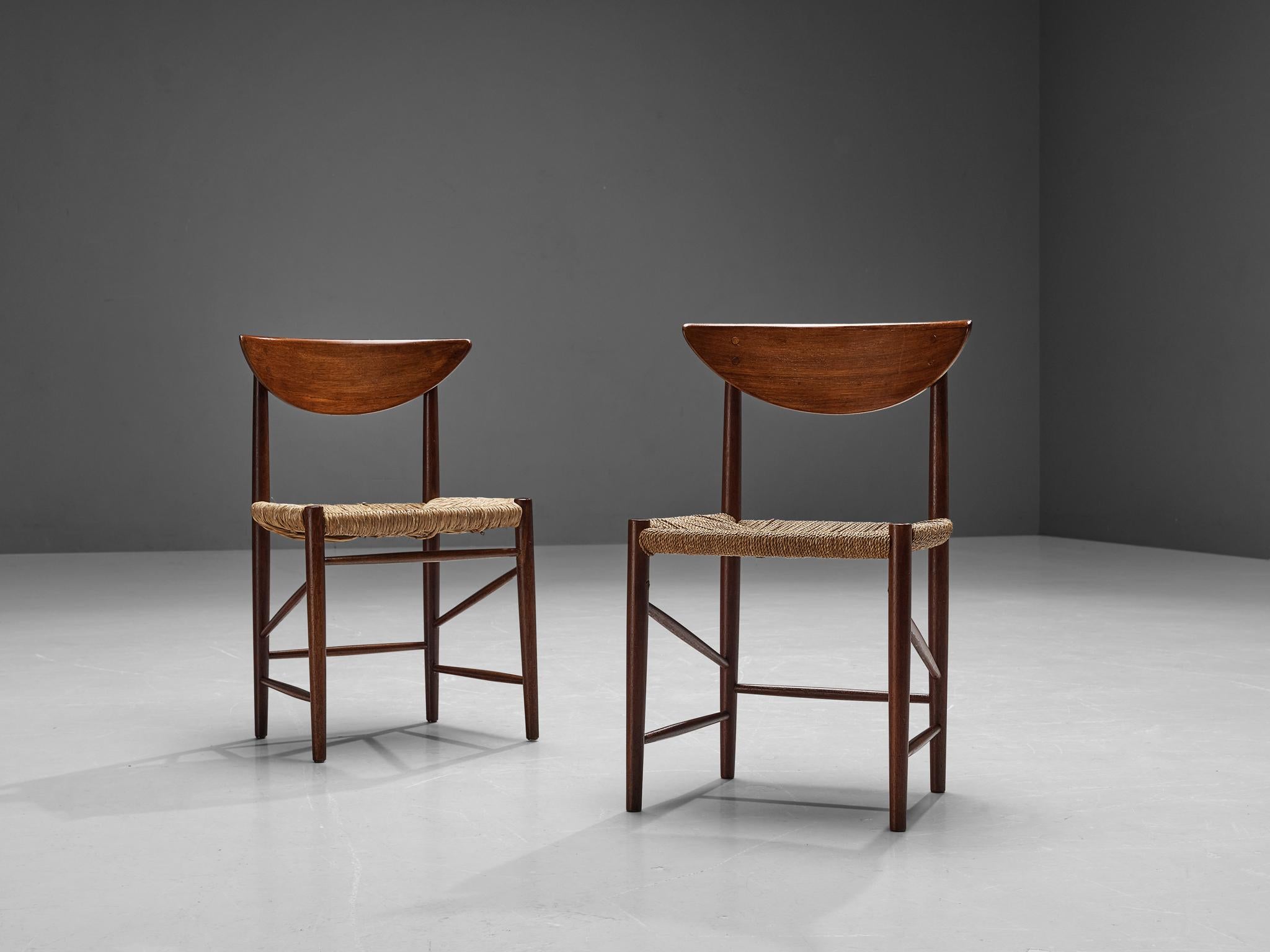 Peter Hvidt & Orla Mølgaard-Nielsen for Søborg Møbelfabrik, pair of dining chairs model 316, teak, papercord, Denmark, 1950s.

This organic looking pair of chairs are made with an outstanding attention to detail as seen in the beautiful, curved