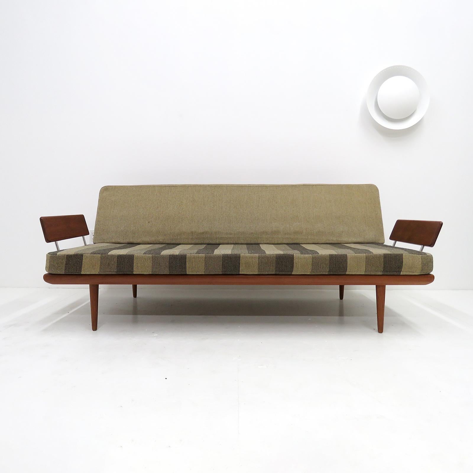 Wonderful daybed / sofa model FD 417 'Minerva' by Peter Hvidt & Orla Mølgaard Nielsen for France & Son, Denmark, 1960s with original spring core seat and back cushions, in original wool upholstery on a solid teak frame with chrome plated steel