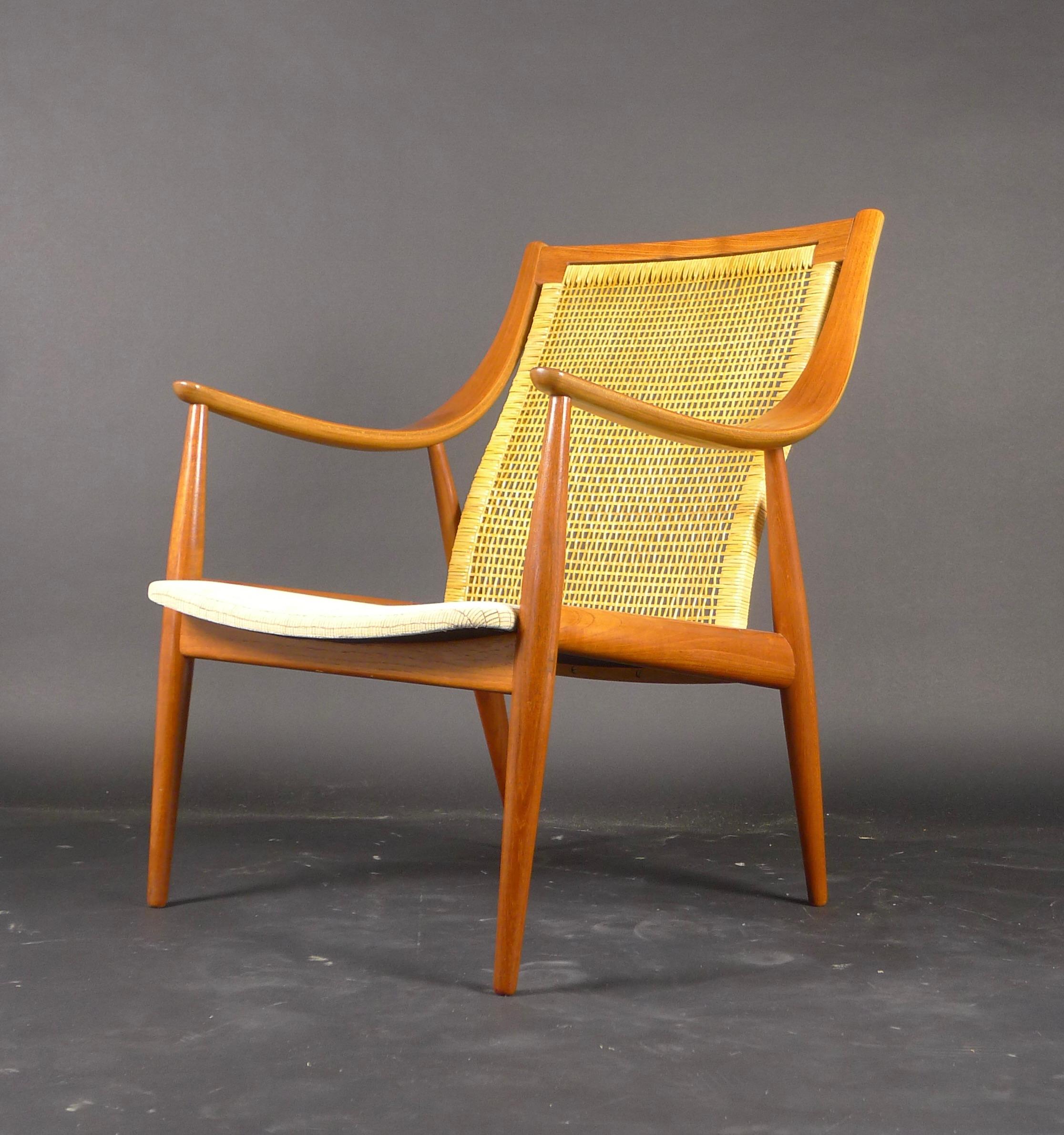Peter Hvidt & Orla Mølgaard-Nielsen, Model 146 Easy Chair, France & Son, 1950s

Teak frame with cane back panel, upholstered drop-in seat, France & Son label

Condition very good, with new upholstery.