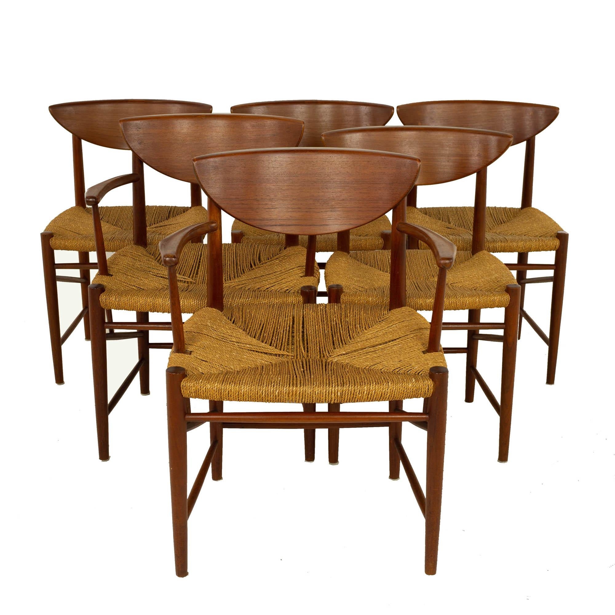 Peter Hvidt and Orla Mølgaard Nielsen Model 316 for Soborg Mid Century Teak Dining Chairs - Set of 6

Each chair measures: 23.75 wide x 20.25 deep x 30.25 high, with a seat height of 18 inches and arm height/chair clearance of 26 inches

All