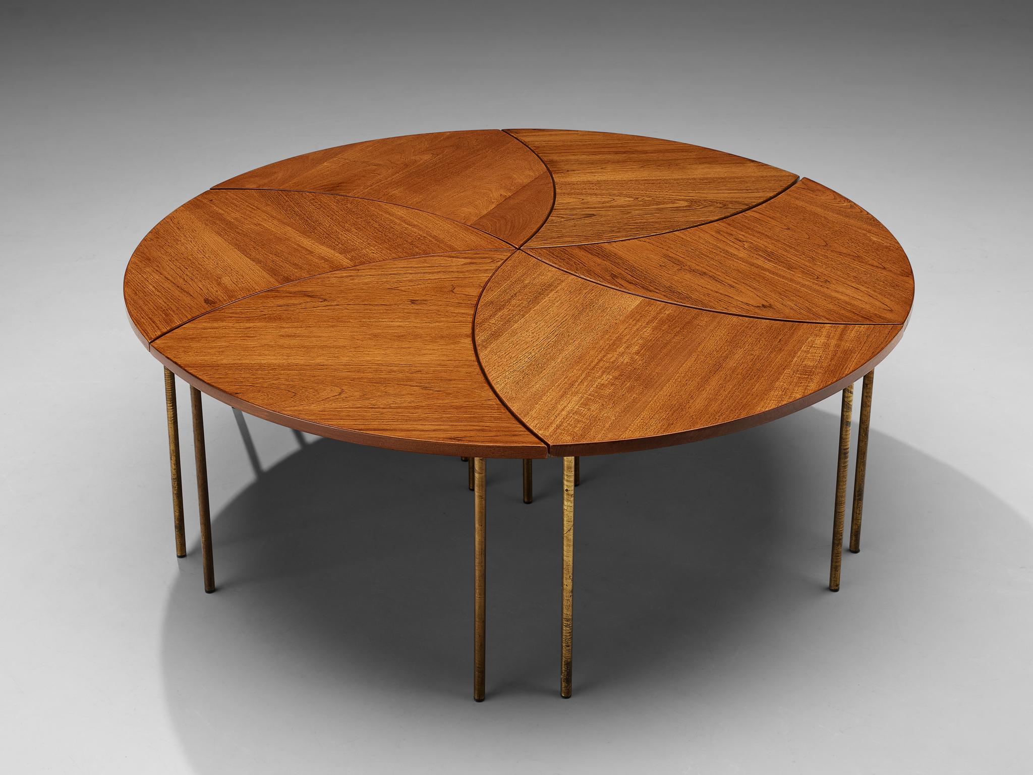 Peter Hvidt and Orla Mølgaard Nielsen coffee table 'FD 523', teak, brass, Denmark, 1952

A modular coffee table, consisting of 6 organic segments in triangular format. Together the six parts can form one large round coffee table or be arranged in