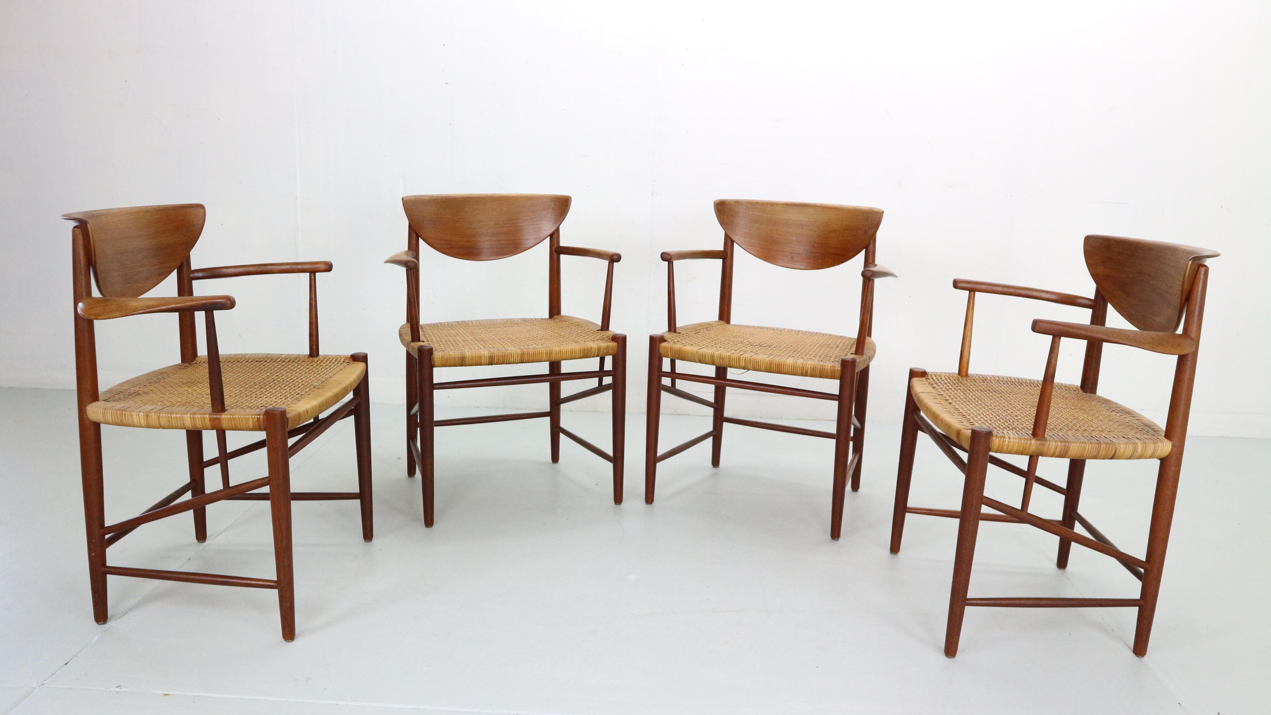 Scandinavian Modern period set of 4 armchairs or dinning room chairs designed by Peter Hvidt & Orla Mølgaard Nielsen and manufactured for Søborg Møbelfabrik in 1950's Denmark.

Chairs are made of solid teak beautifully curved frame, back rest and