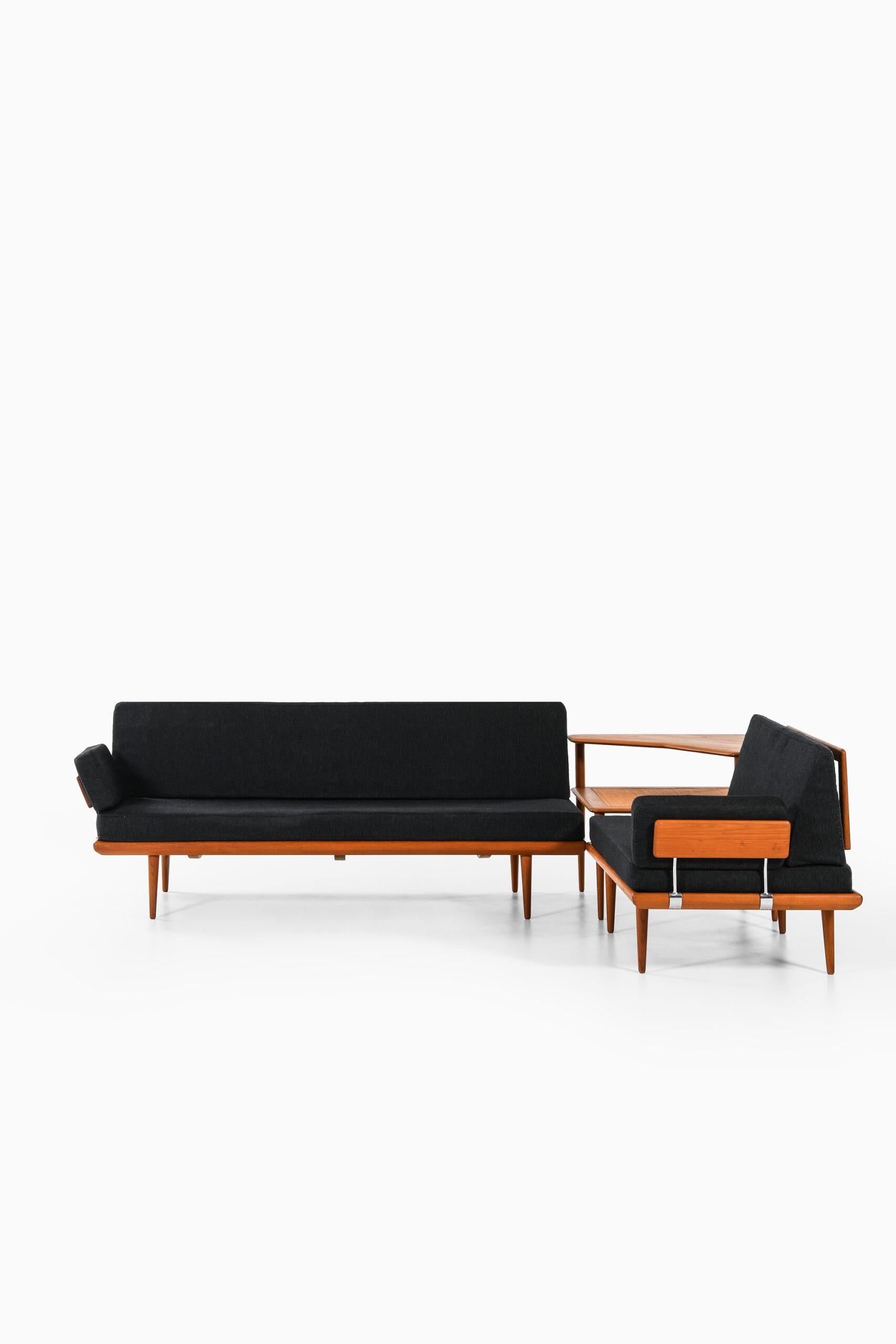 Sofa model Minerva designed by Peter Hvidt & Orla Mølgaard-Nielsen. Produced by France & Daverkosen in Denmark. Seating group with 3 seater, 2 seater and side table.
Dimensions: 3-seater (W x D x H): 190 x 77 x 79 cm, SH: 40 cm.
Dimensions: