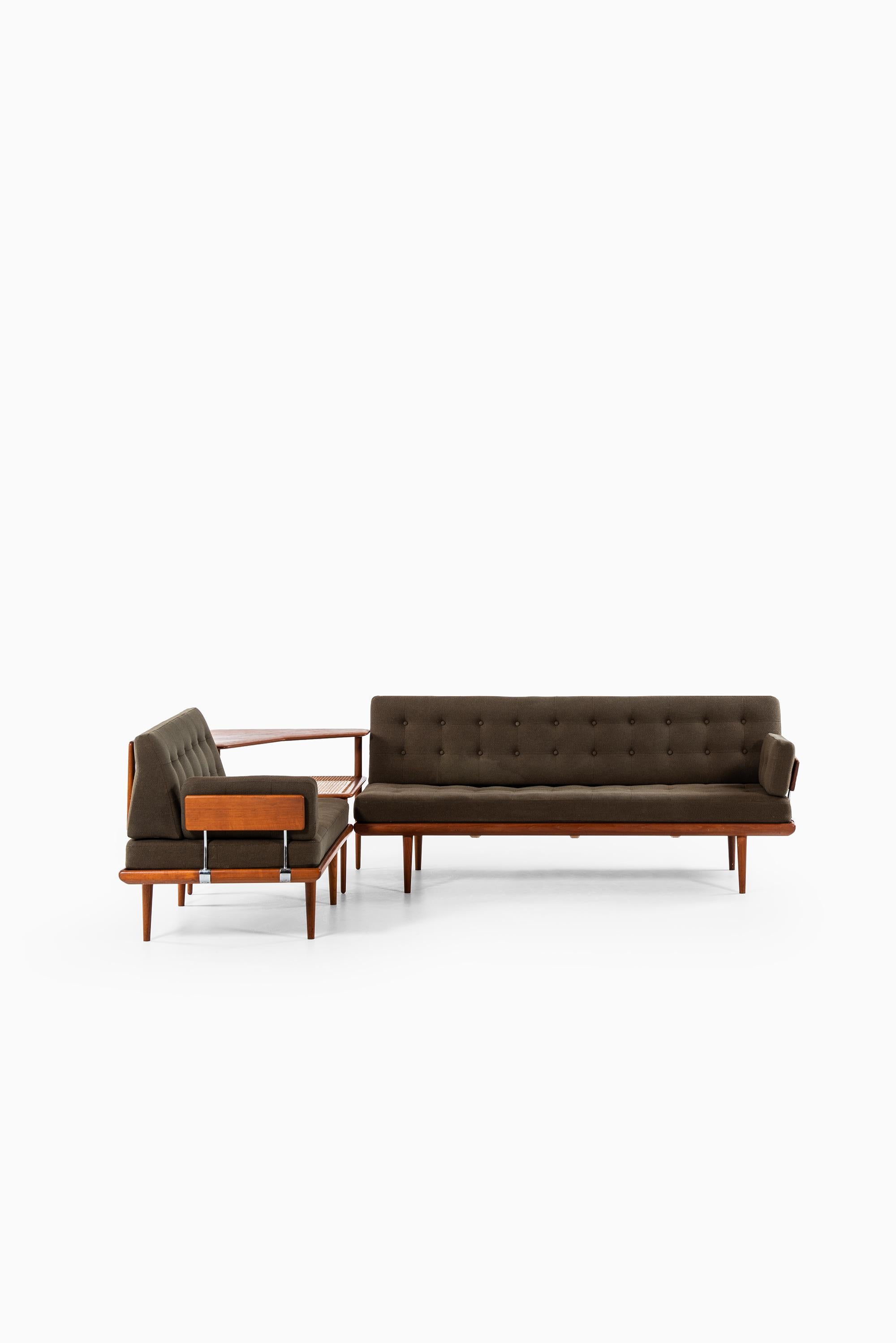 Sofa model Minerva designed by Peter Hvidt & Orla Mølgaard-Nielsen. Produced by France & Daverkosen in Denmark.

Dimensions 3-seat (W x D x H): 190 x 77 x 79 cm, SH: 40 cm
Dimensions 2-seat (W x D x H): 125 x 77 x 79 cm, SH: 40 cm
Dimensions