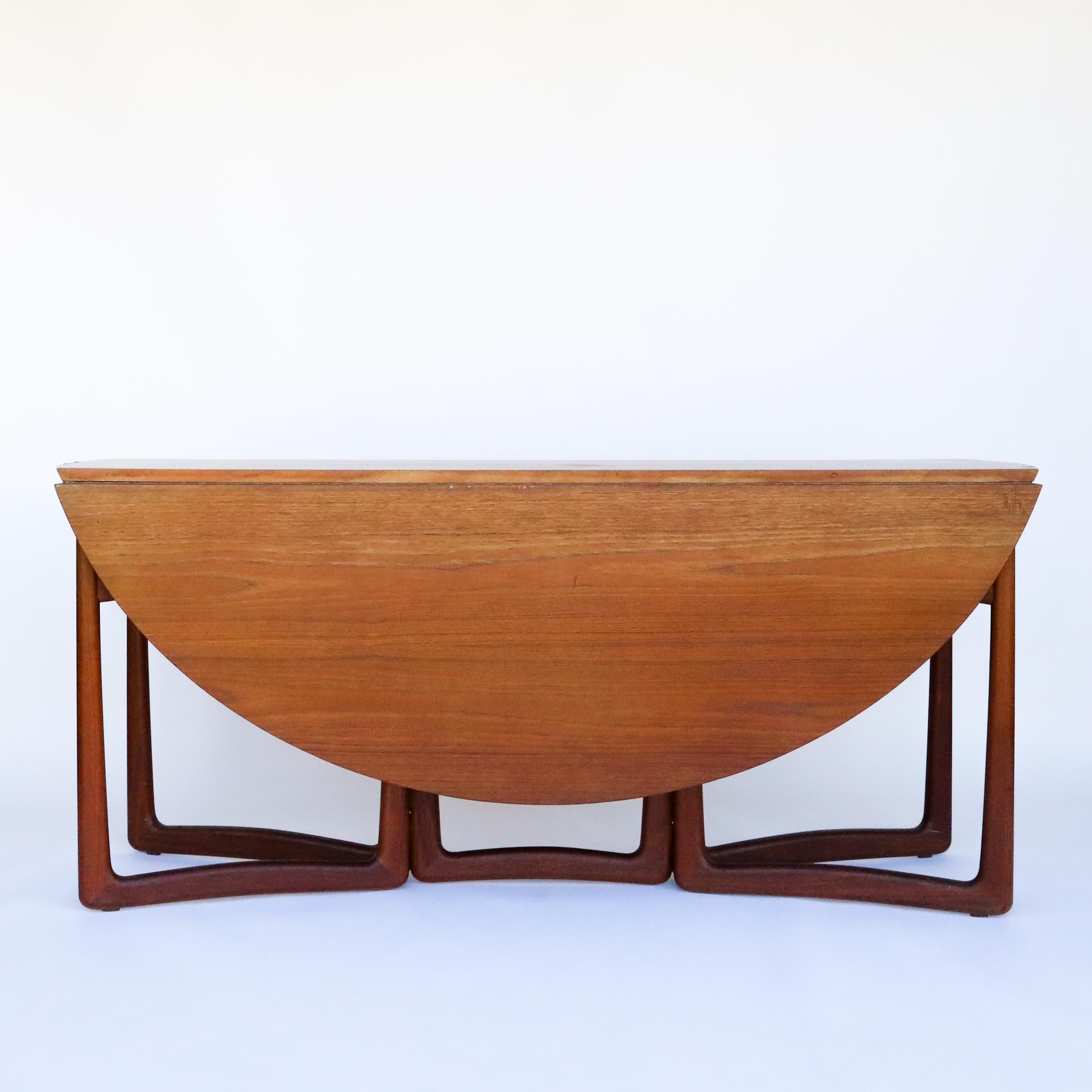 This is a Gateleg drop leaf table by Peter Hvidt and Orla Mølgaard-Nielsen for France & Son in Denmark. This is going to be a stunning conversation piece once we restore it to great condition. Elegant and simple, super high-quality Danish table.