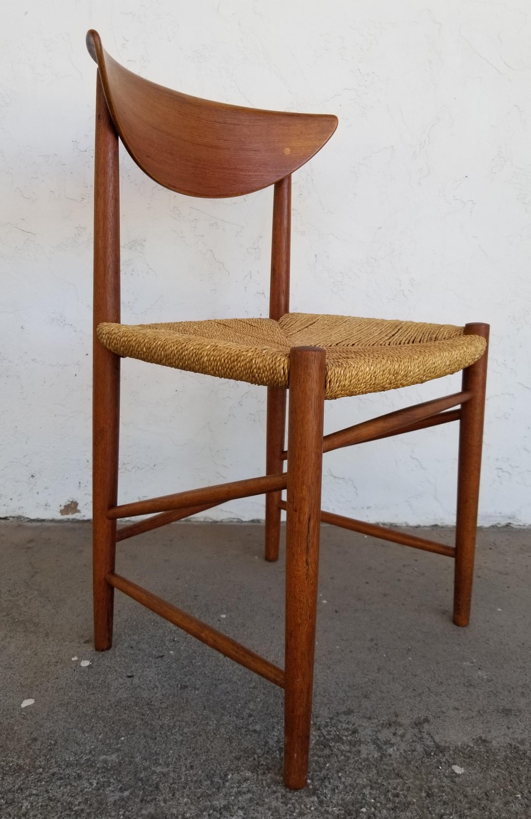 An exceptional set of 10 teak Danish modern dining chairs by Peter Hvidt & Orla Mølgaard-Nielsen. Original finish with wonderful glow to patina. Original grass cord or wicker seats in very good original condition. Set consists of nine side chairs