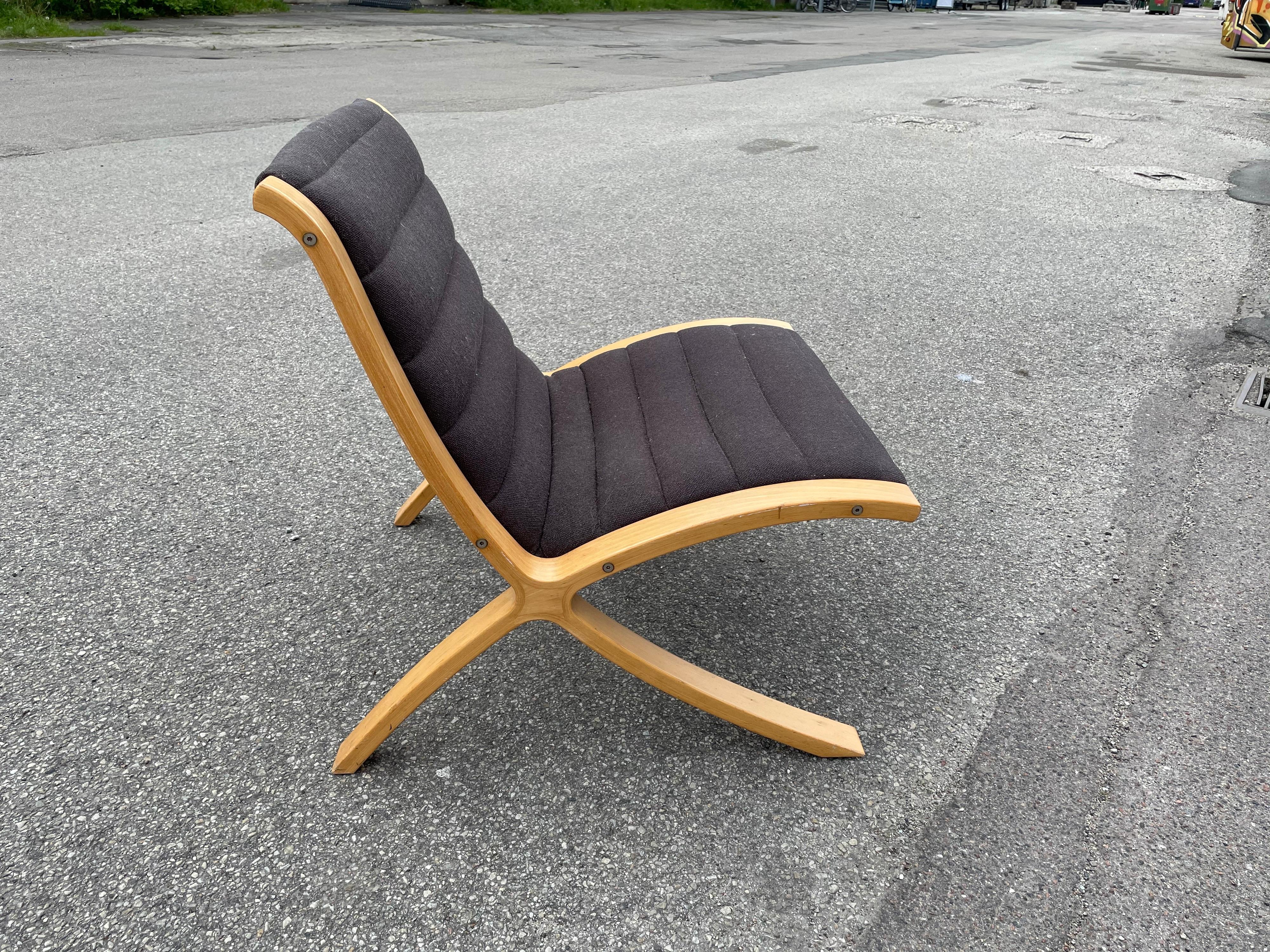 The X-chair designed by Peter Hvidt & Orla Mølgaard Nielsen for Fritz Hansen, Denmark, 1979. The chair is in original condition with the Fritz Hansen sticker at the bottom.