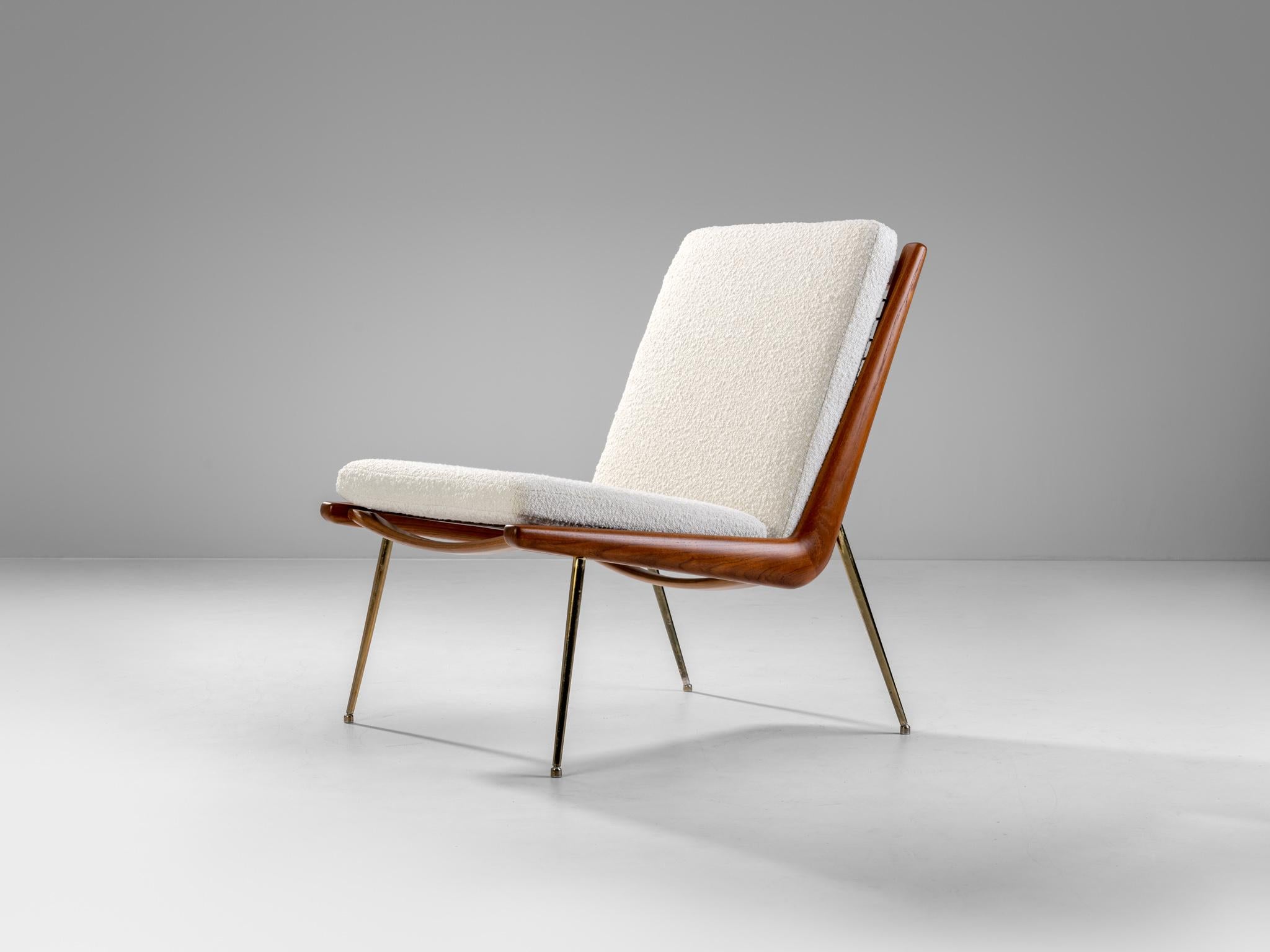 The Boomerang chair is one of the most elegant chair designs of the Mid Century period and it was designed by Architects Peter Hvidt & Orla Molgaard Nielsen in 1954 and this particular example was produced by France & Son.

The Teak frame was