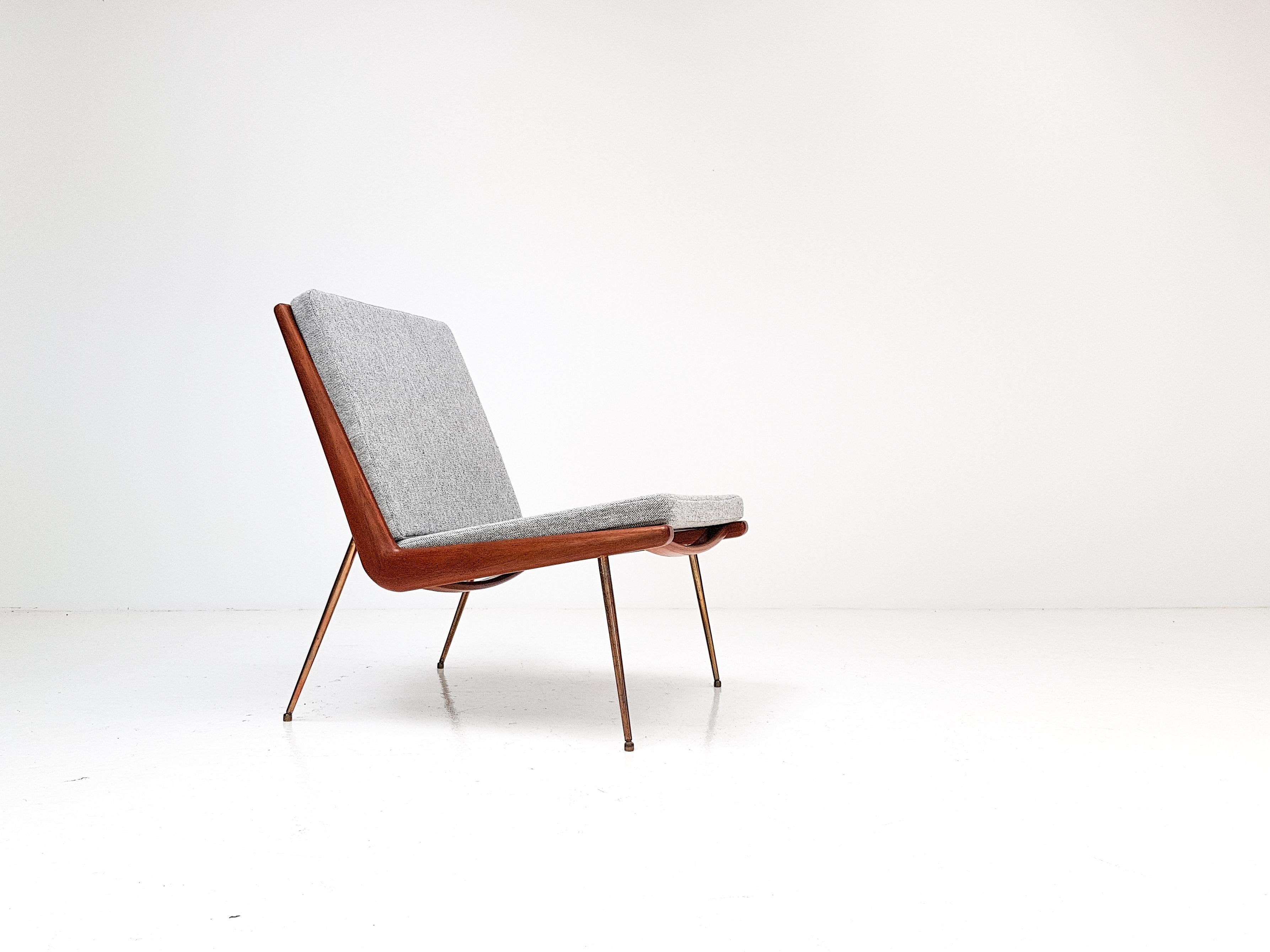 A Peter Hvidt & Orla Molgaard-Nielsen designed FD-134 'Boomerang' lounge chair for France & Son, Denmark, 1950s.

The chair has a boomerang-shaped frame in teak from which its name derives, brass legs, new cushions and new Kvadrat wool