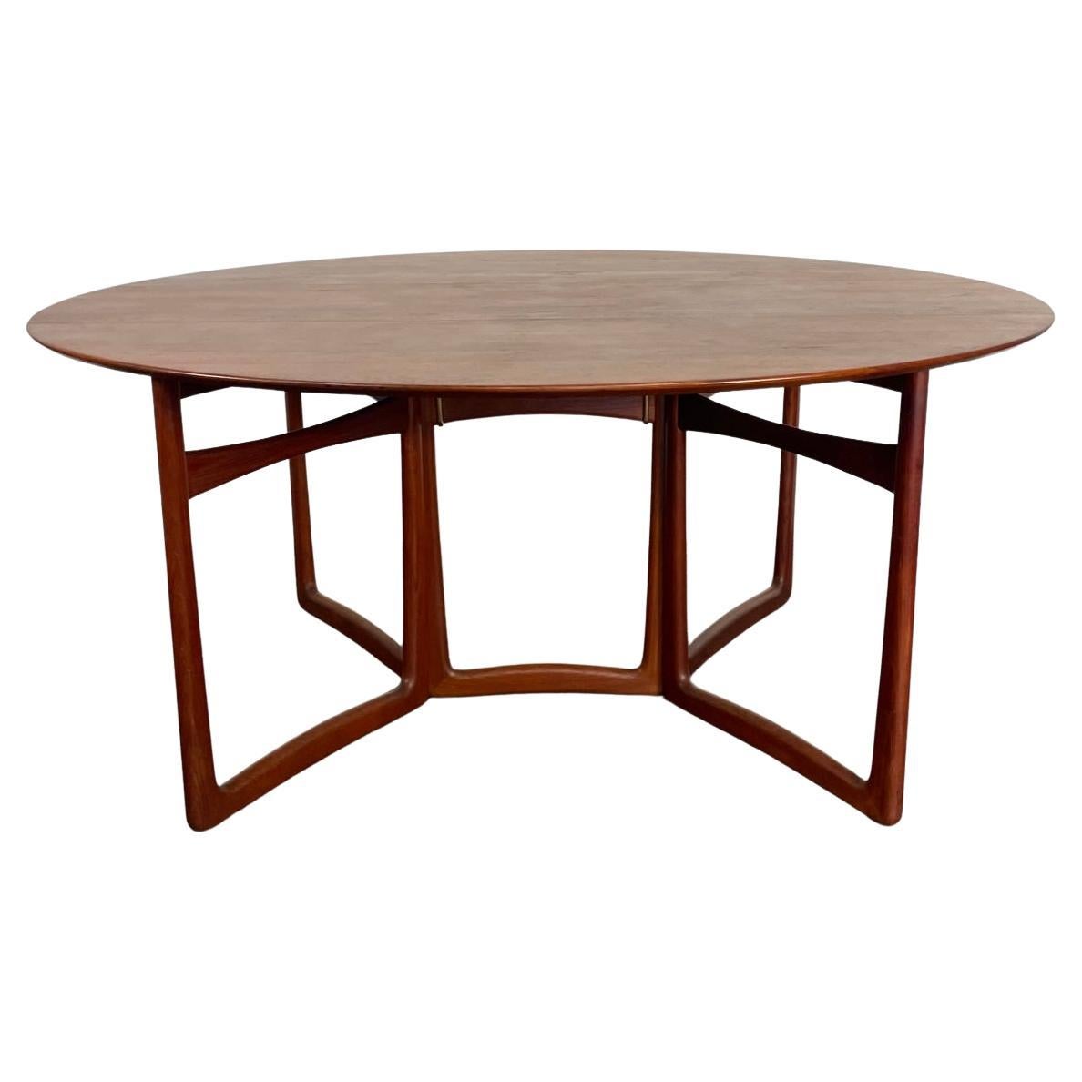 Peter Hvidt & Orla Molgaard-Nielsen Drop Leaf Dining Table in Solid Teak