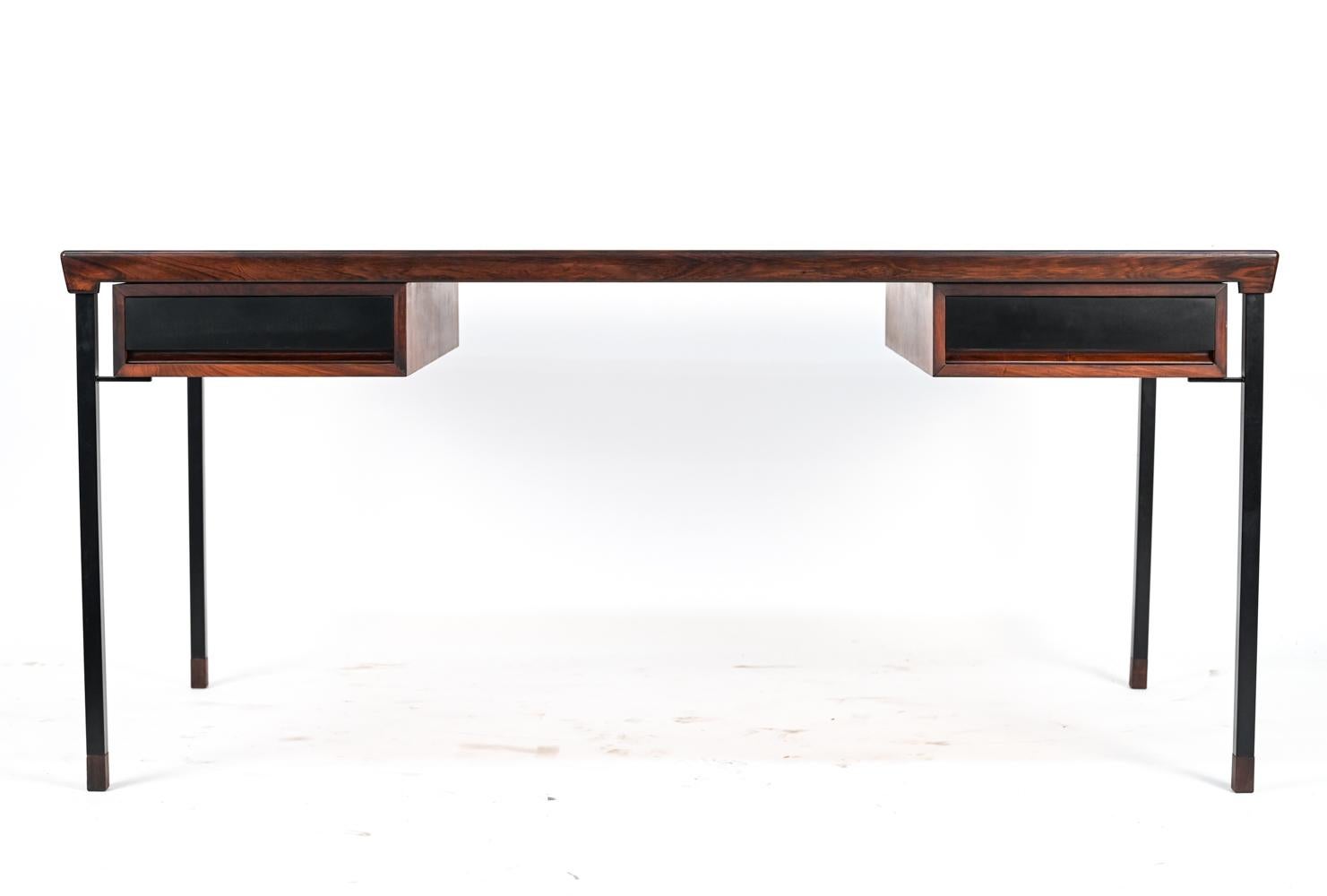 This fabulous Danish 
midcentury writing desk was the result of a collaborative design effort by Peter Hvidt and Orla Molgaard-Nielsen for Soborg Mobelfabrik, circa 1950s. Like Hvidt and Molgaard's other collaborations, this desk features steel legs