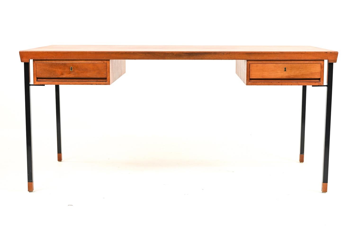 This fabulous Danish teak mid-century writing desk was the result of a collaborative design effort by Peter Hvidt and Orla Mølgaard-Nielsen for Soborg Mobelfabrik, circa 1950s. Like Hvidt and Molgaard's other collaborations, this desk features steel