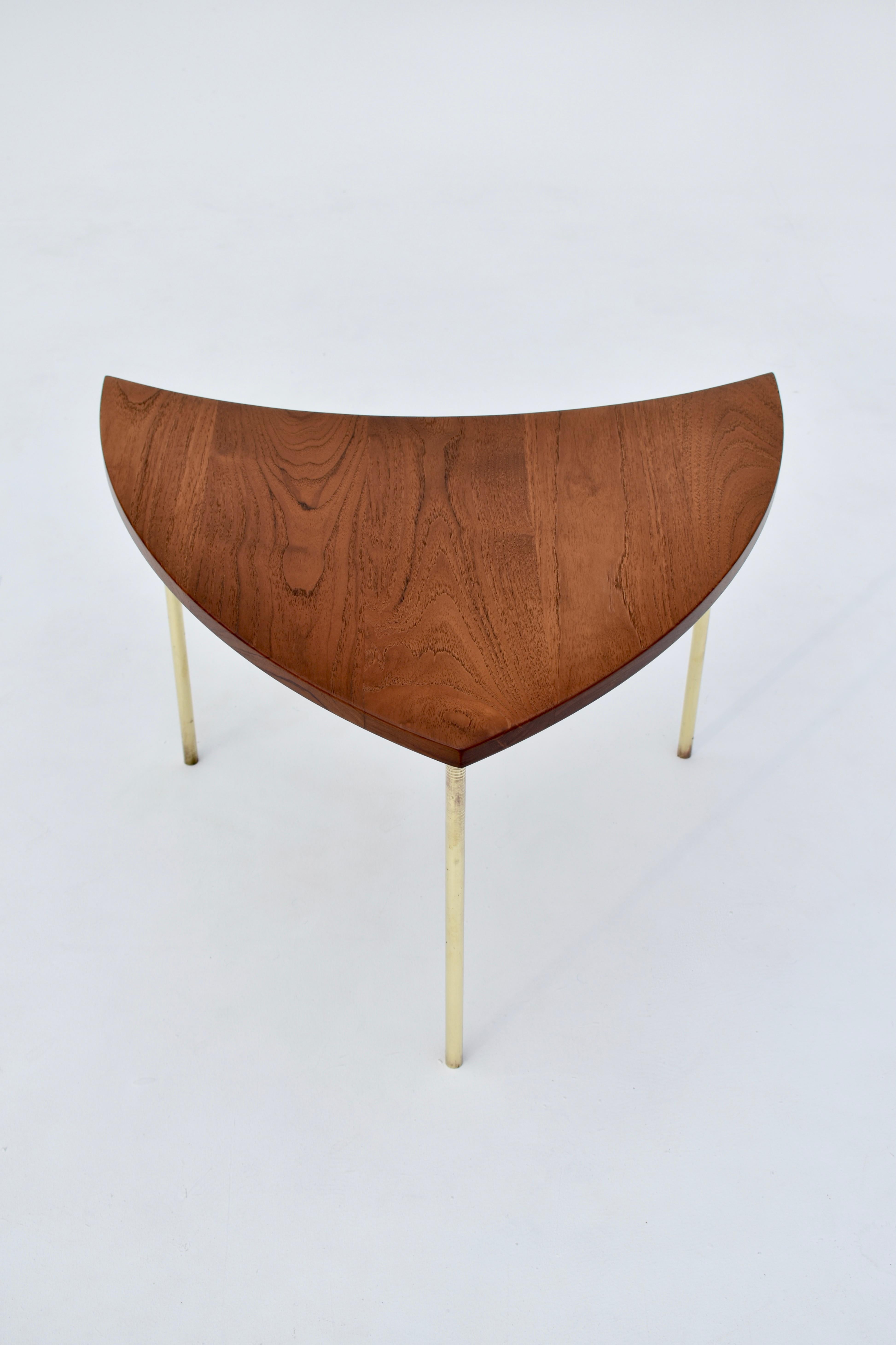 A very hard to find Pinwheel table designed in the mid-1950s by Hvidt & Molgaard.

This listing is for a single table. Produced from solid teak with brass-plated legs.

An incredibly eye-catching and elegant design. Excellent as a statement side