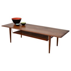 Peter Hvidt 
Orla Molgaard Nielsen Teak 
Brass Coffee Table for France 
Son