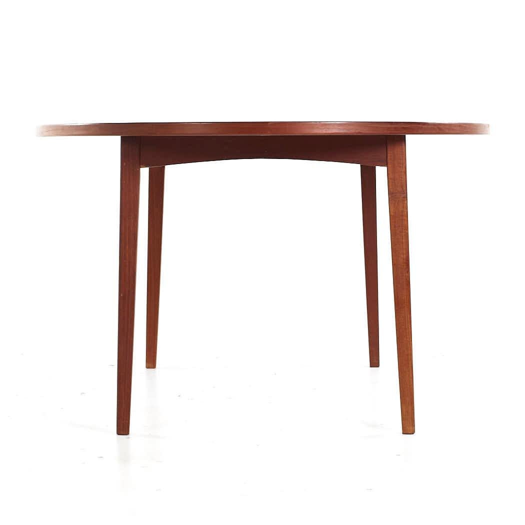 Late 20th Century Peter Hvidt Style Mid Century Danish Expanding Teak Dining Table with 2 Leaves For Sale