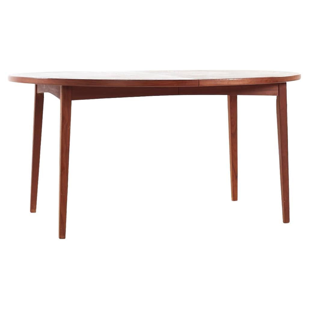 Peter Hvidt Style Mid Century Danish Expanding Teak Dining Table with 2 Leaves For Sale