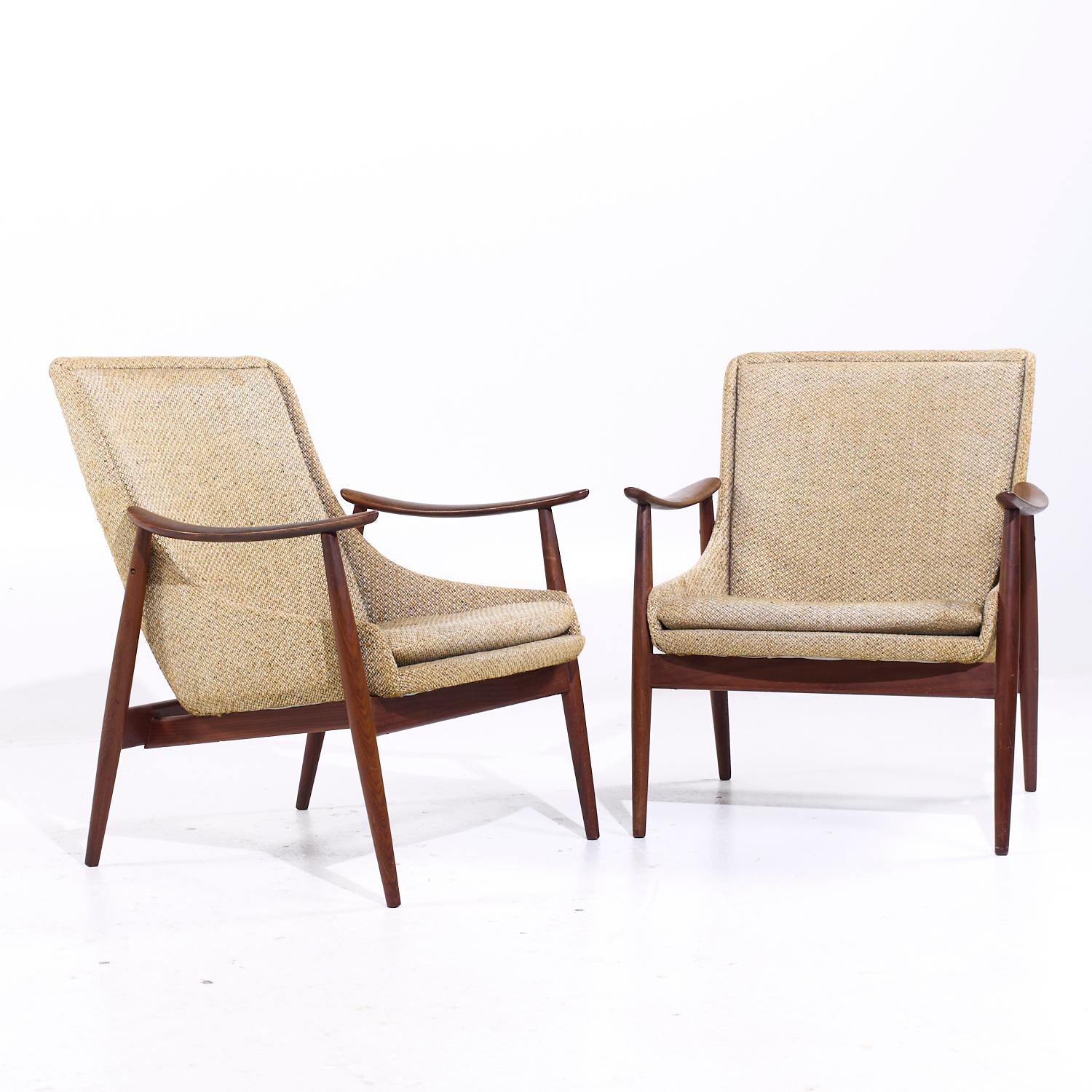 Peter Hvidt Style Mid Century Danish Teak Lounge Chairs - Pair

Each chair measures: 26.25 wide x 30 deep x 31.25 high, with a seat height of 16 and arm height/chair clearance of 22.75 inches

All pieces of furniture can be had in what we call
