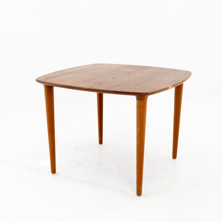 Peter Hvidt style mid century Danish teak side end table
This table is 27 wide x 27 deep x 20 inches high

All pieces of furniture can be had in what we call restored vintage condition. That means the piece is restored upon purchase so it’s free