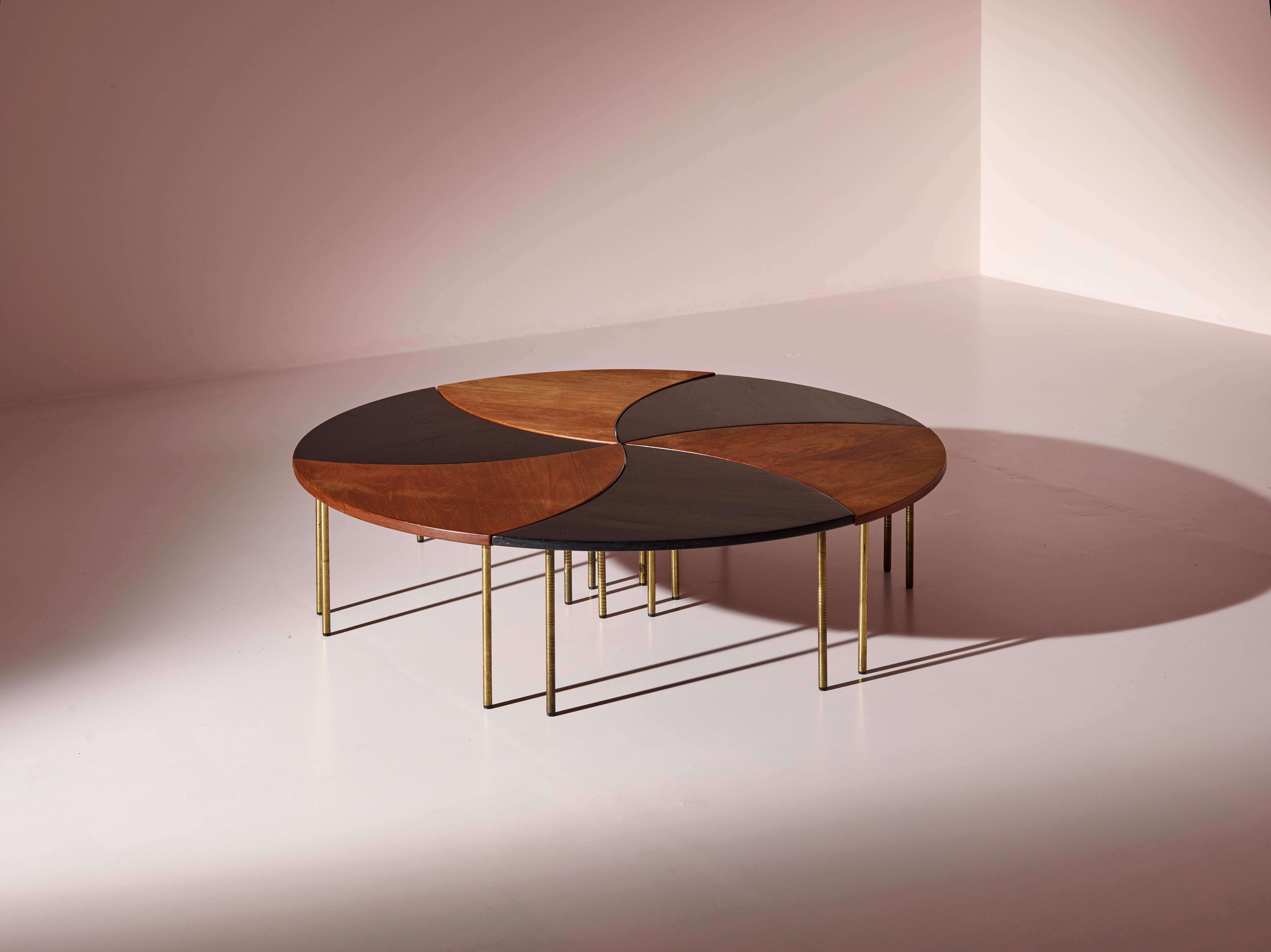 This beautiful an rare two-tone modular coffee table was designed by the renowned Danish designer Peter Hvidt in 1952 and produced by the cabinetmaker France & Son in the early 1950s.

The piece is a stunning example of mid-century modern design: