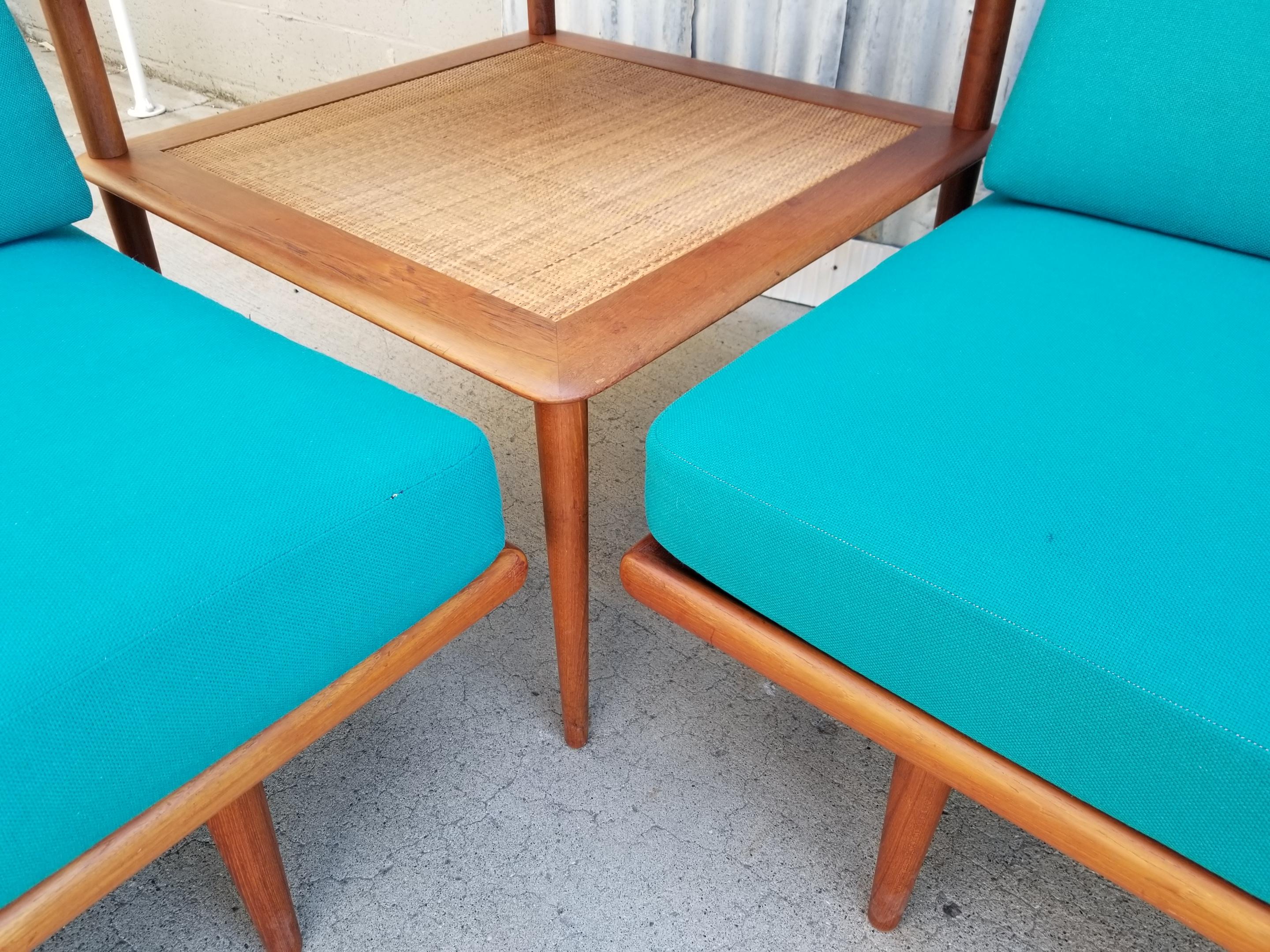 A fine Peter Hvidt / Orla Molgaard Nielsen teak Danish modern 3 piece sofa set. Consisting of 2 sofas and a corner table. All pieces retain France & Son and John Stuart labels. Excellent craftsmanship crafted entirely of solid teak. Deep, rich glow