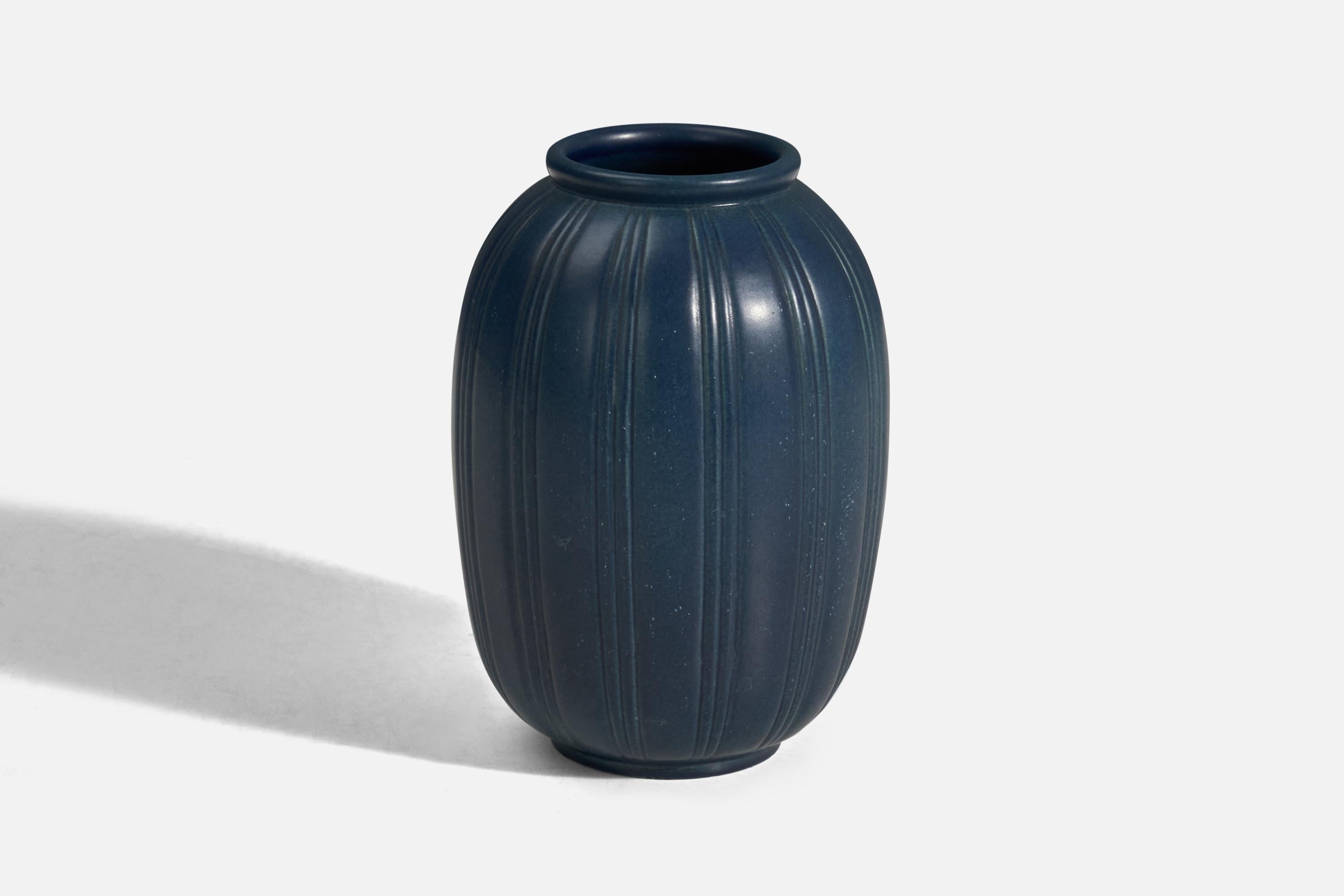 A blue glazed stoneware vase designed and produced by Peter Ipsen Enke, Denmark, 1940s.
