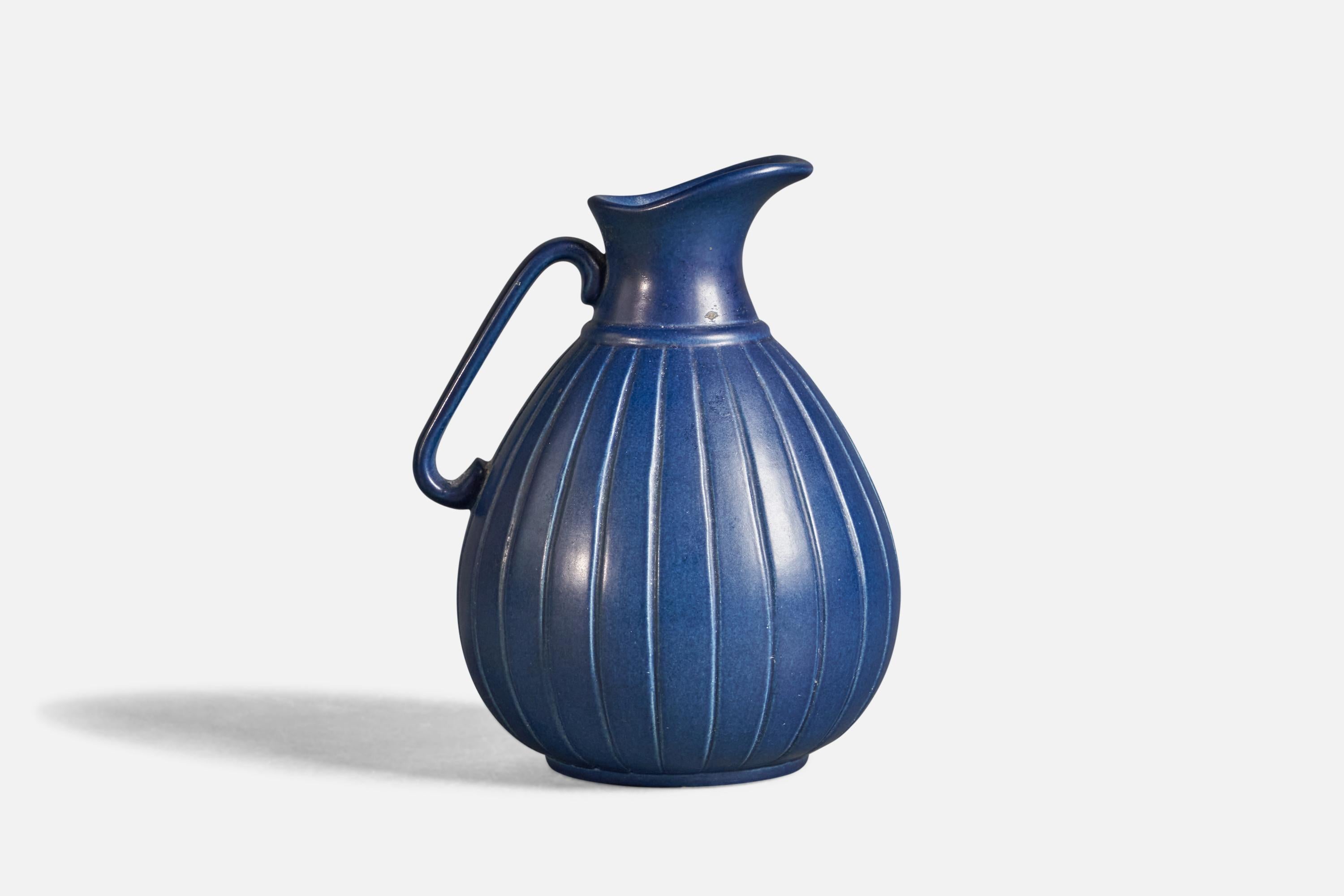 A blue-glazed stoneware pitcher or vase, designed and produced by Peter Ipsens Enke, Denmark, c. 1940s.
