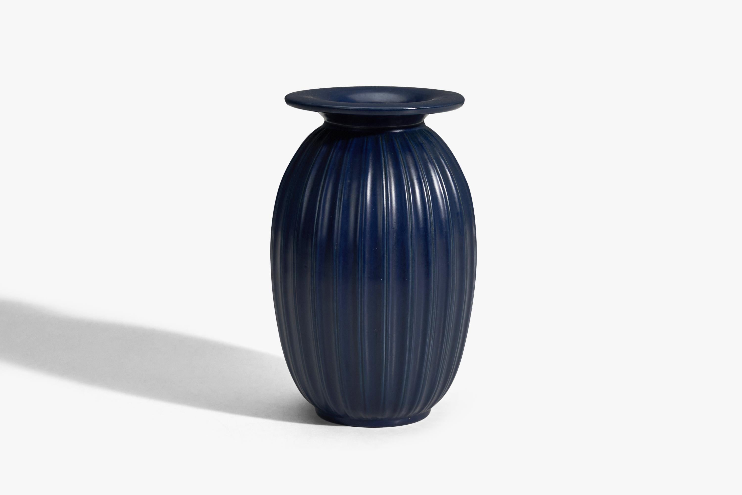 A blue glazed stoneware designed and produced by Peter Ipsens Enke, Denmark, 1940s.