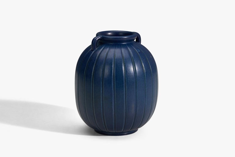 A blue glazed stoneware vase designed and produced by Peter Ipsens Enke, Denmark, 1940s.