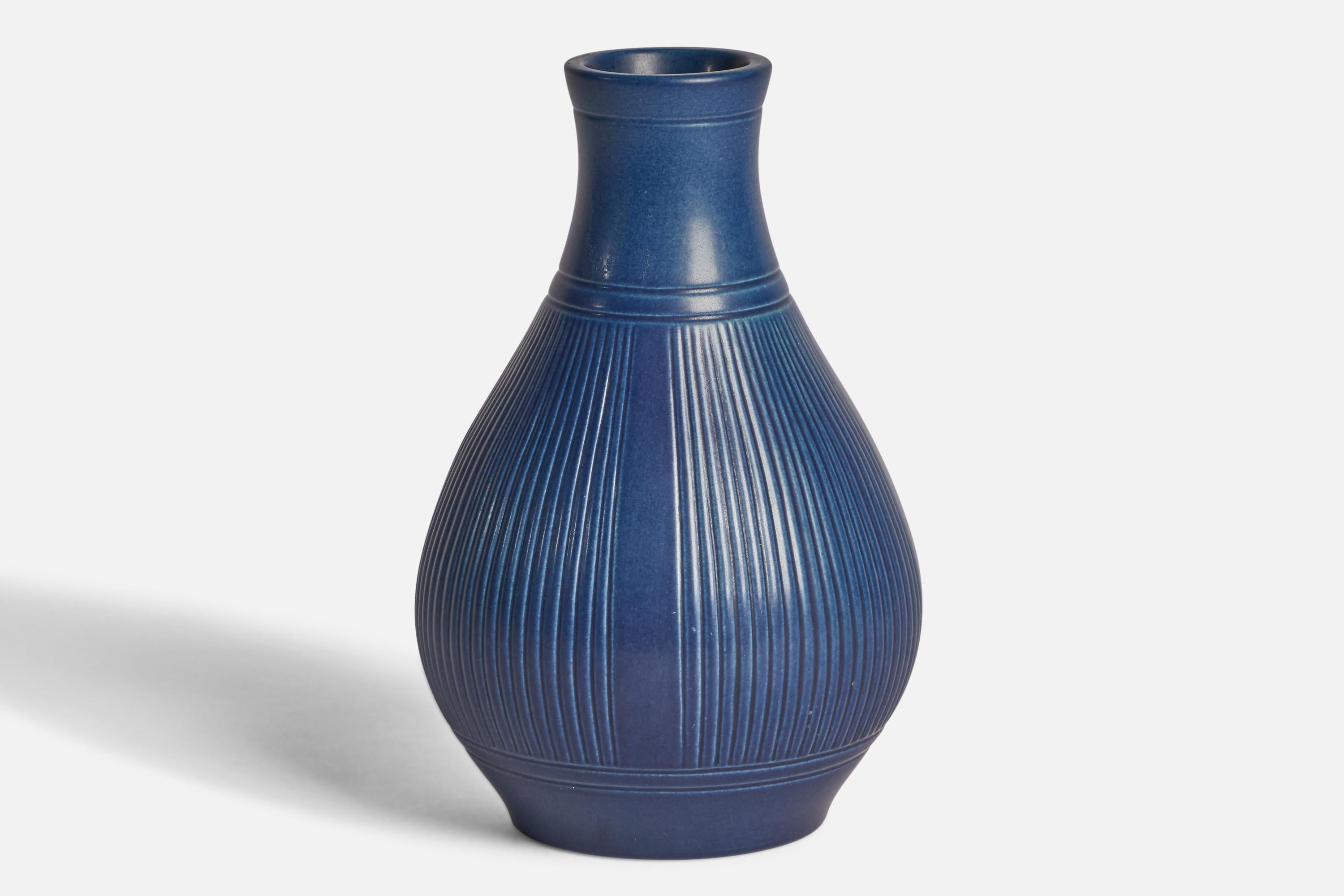 A blue-glazed incised stoneware vase designed and produced by Peter Ipsens Enke, Denmark, 1940s.