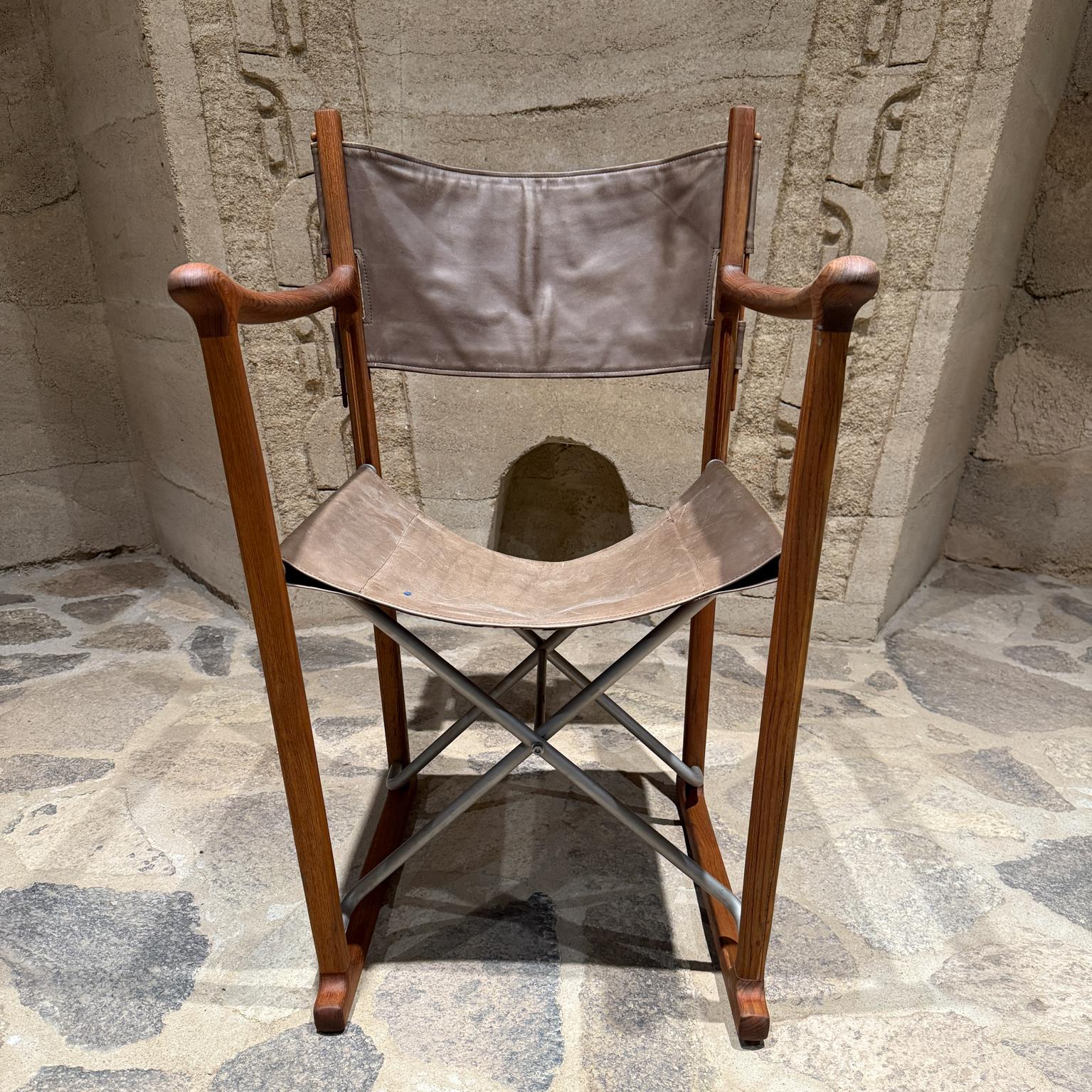 For your consideration, a Campaign Folding Chair by Peter Karpf   for Tripp Trapp Skagerak, Denmark, 1970s.
Constructed with teak, leather  (olive green)  and aluminum. 
Brass label from the maker in the lower section of the legs. 
Chair can be