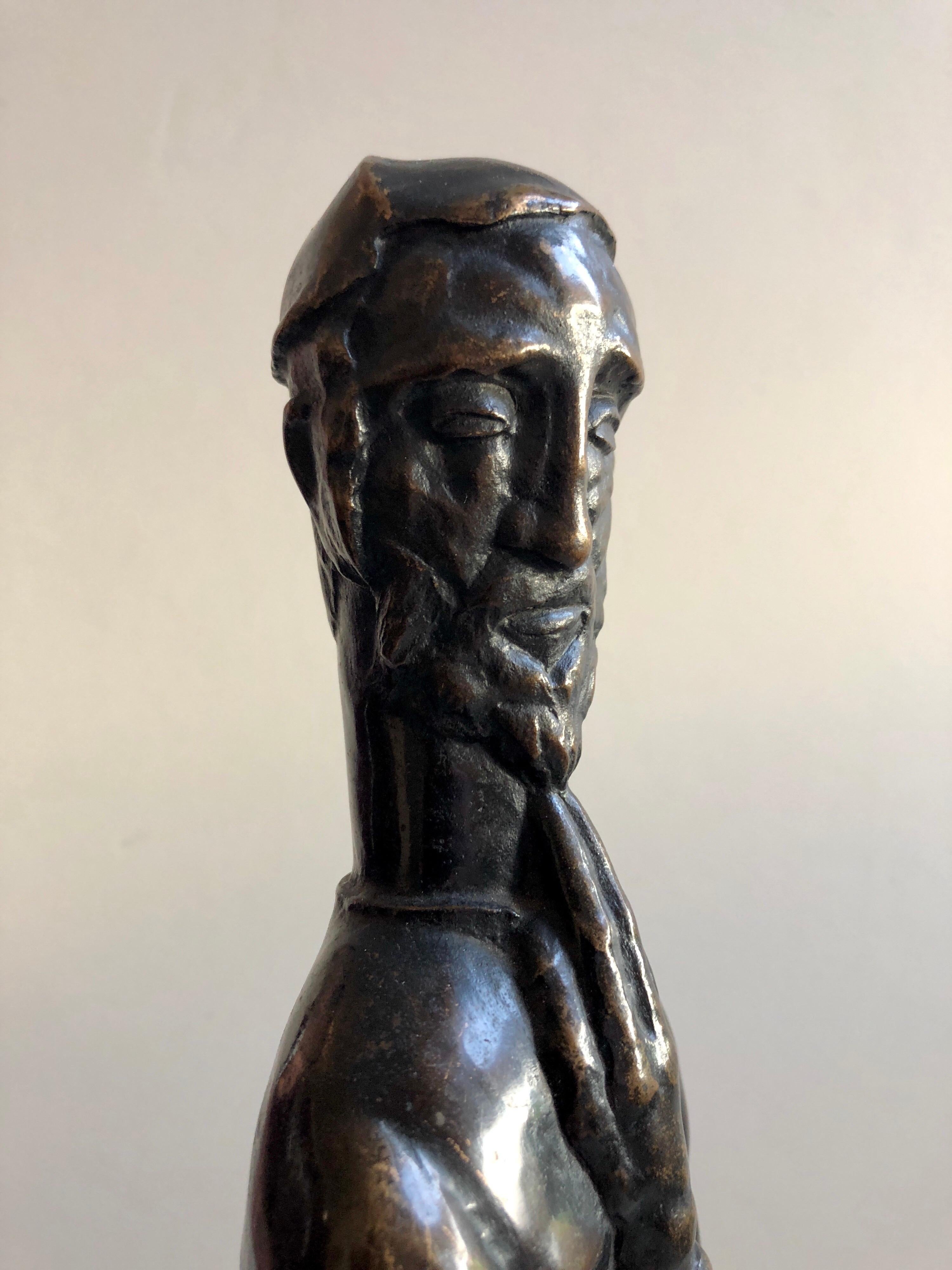 Bronze Jewish Rabbi. Original Patina. Art-deco wood carved base. It is signed with initials P.K. and marked 