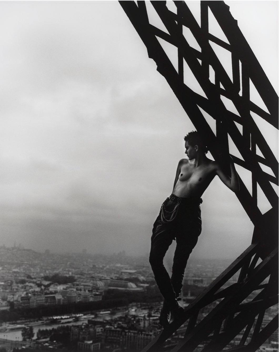 Mathilde on the Eiffel Tower (Hommage to Marc Riboud), Paris, 1989 - Photograph by Peter Lindbergh