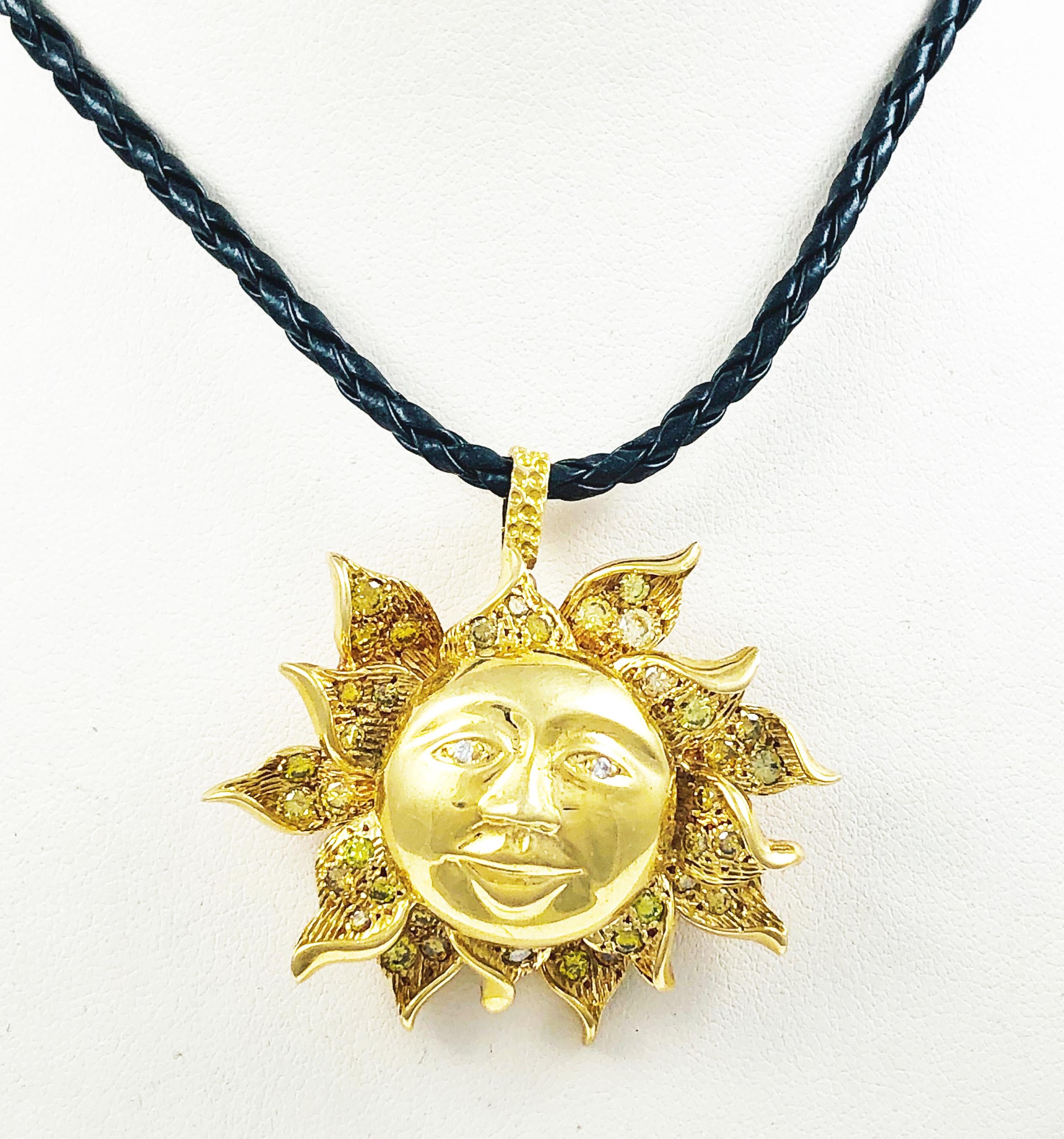 Gorgeous Peter Linderman Sun Pendant! This piece can also be worn as a brooch. This beautiful piece is made in 18K yellow Gold and features 34 various colored diamonds ( Brown, yellow & white)! It  measures 2 inches by 1.75 inches and comes with a