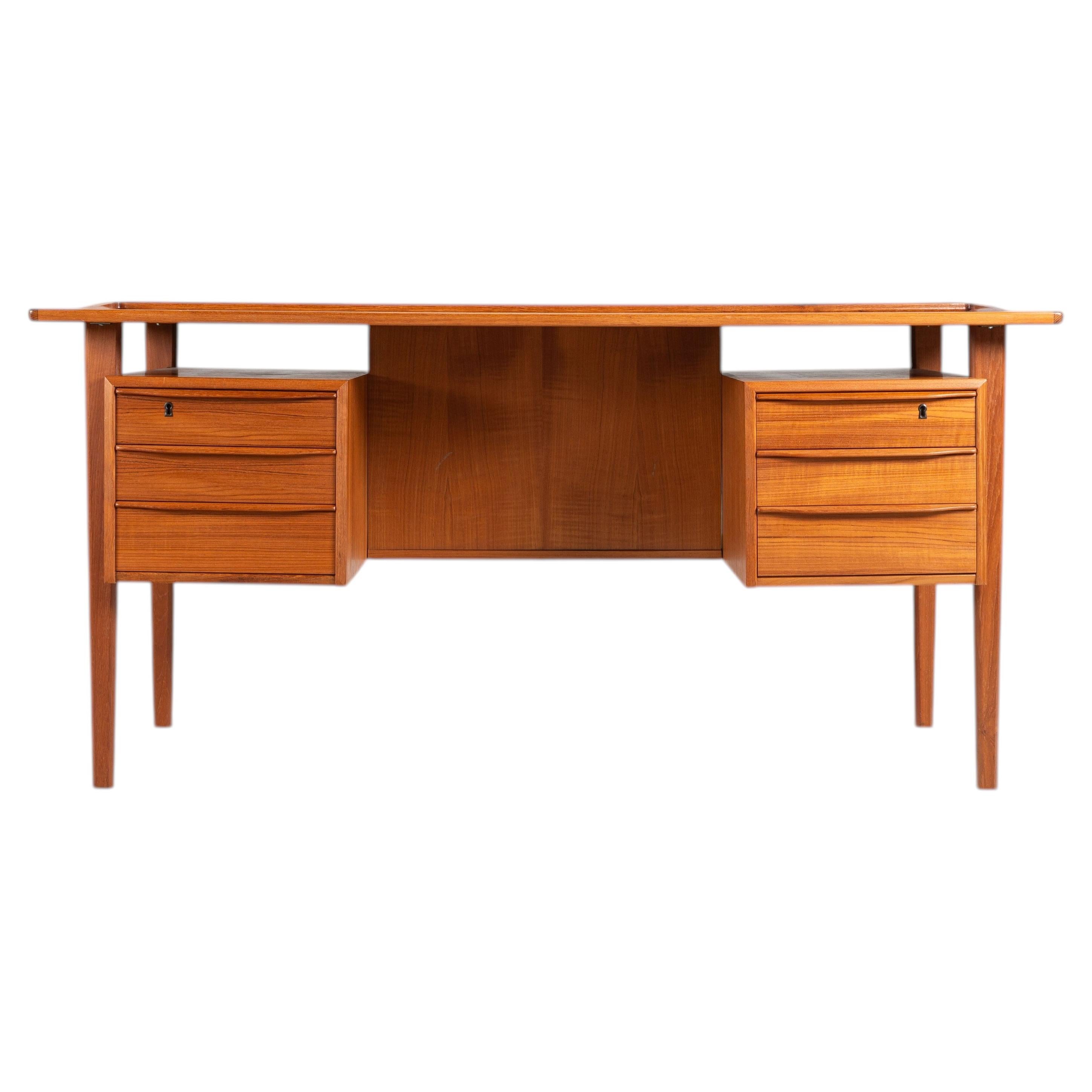 Peter Lovig free standing writing desk in teak Denmark 1960