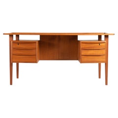 Peter Lovig free standing writing desk in teak Denmark 1960