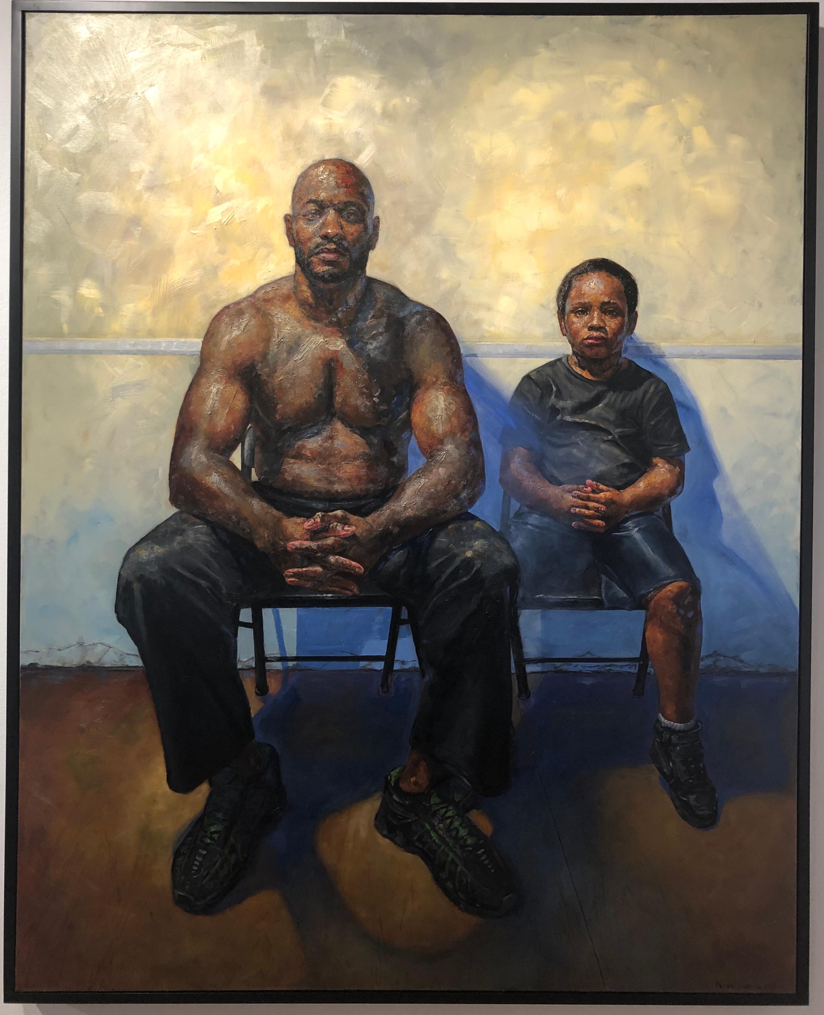 black father and son painting