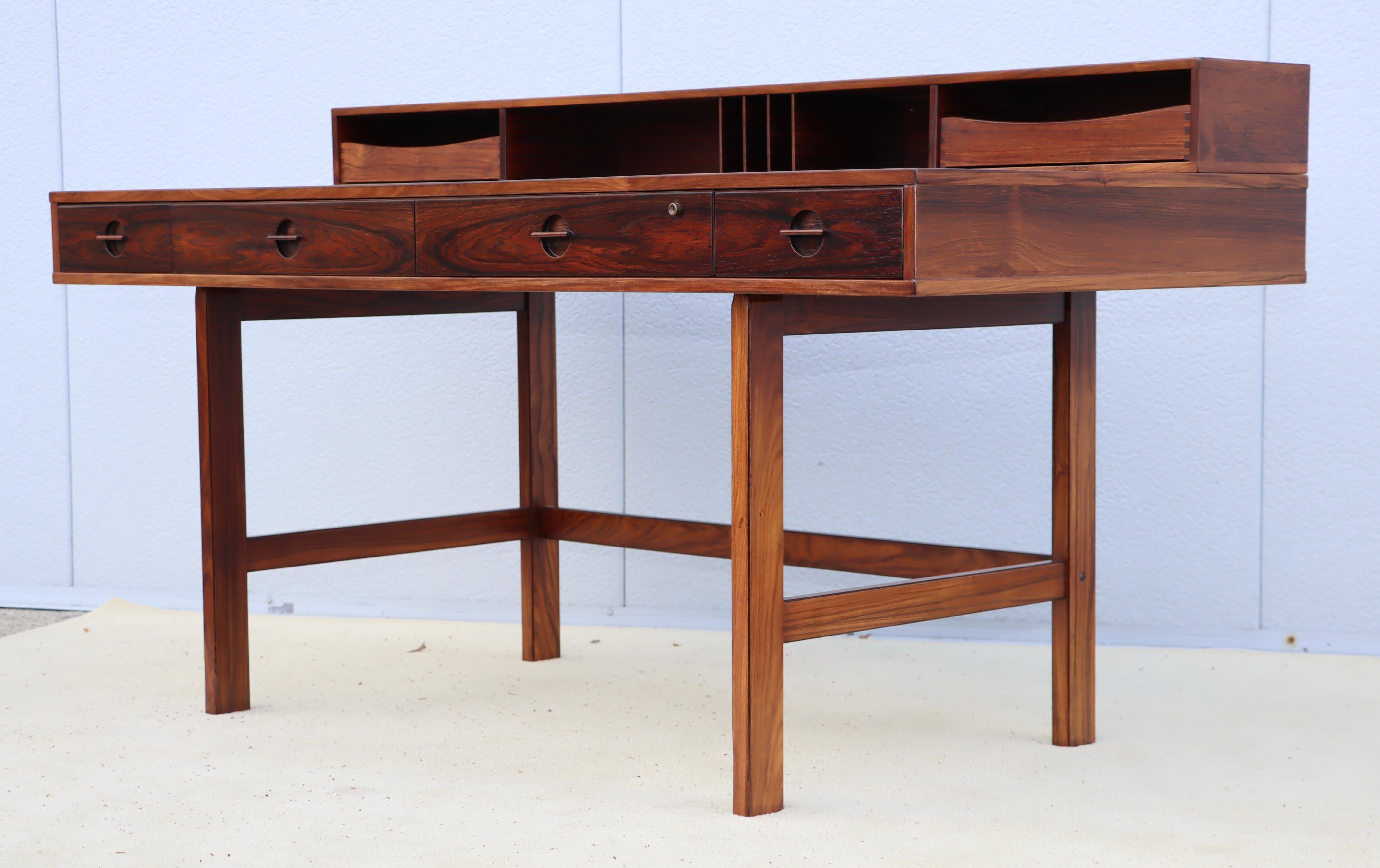 Amazing 1970's Peter Løvig Nielsen rosewood partners desk, lightly restored with some wear and patina due to age and use, there is some wear to the rosewood veneer. 