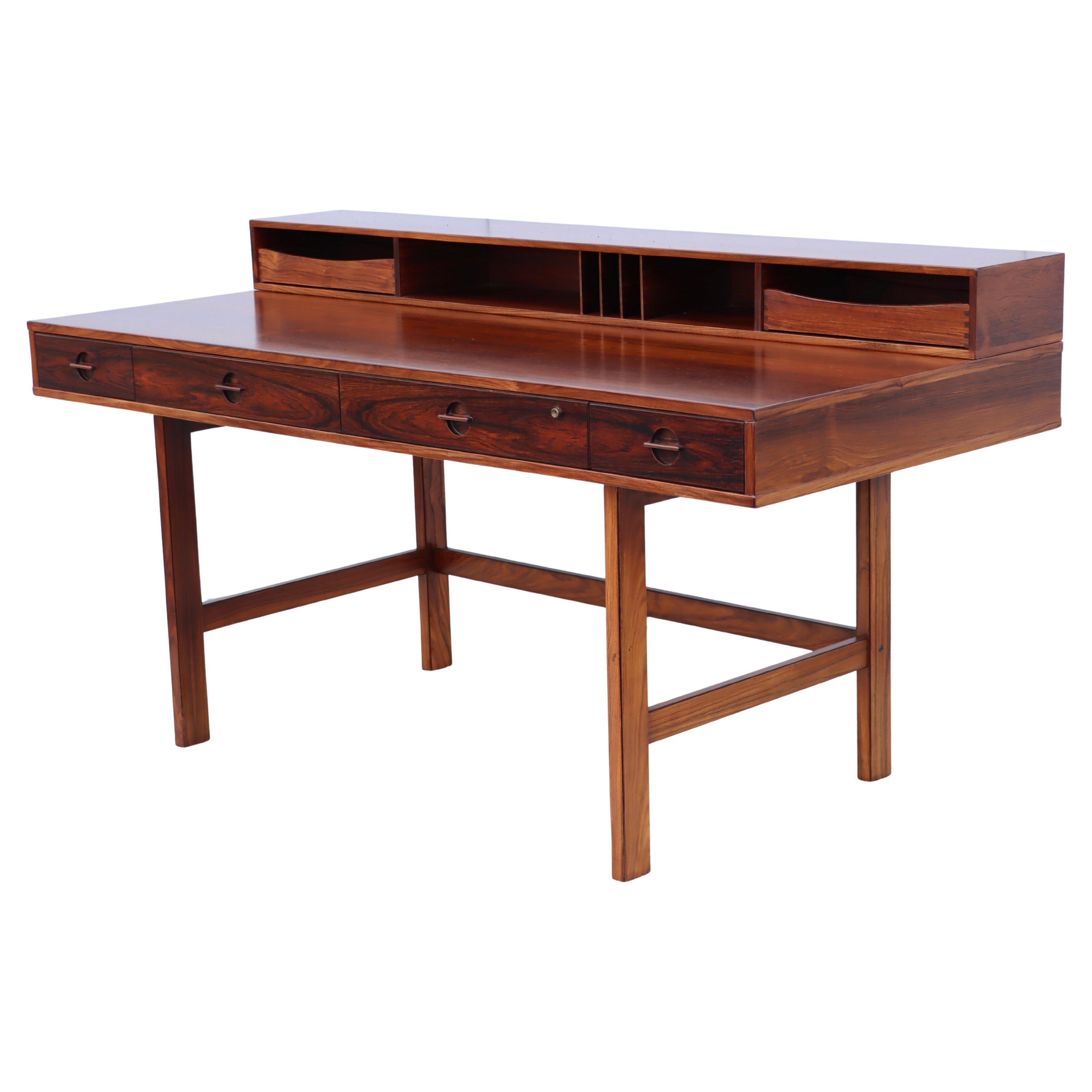 What is the difference between a table and a desk?