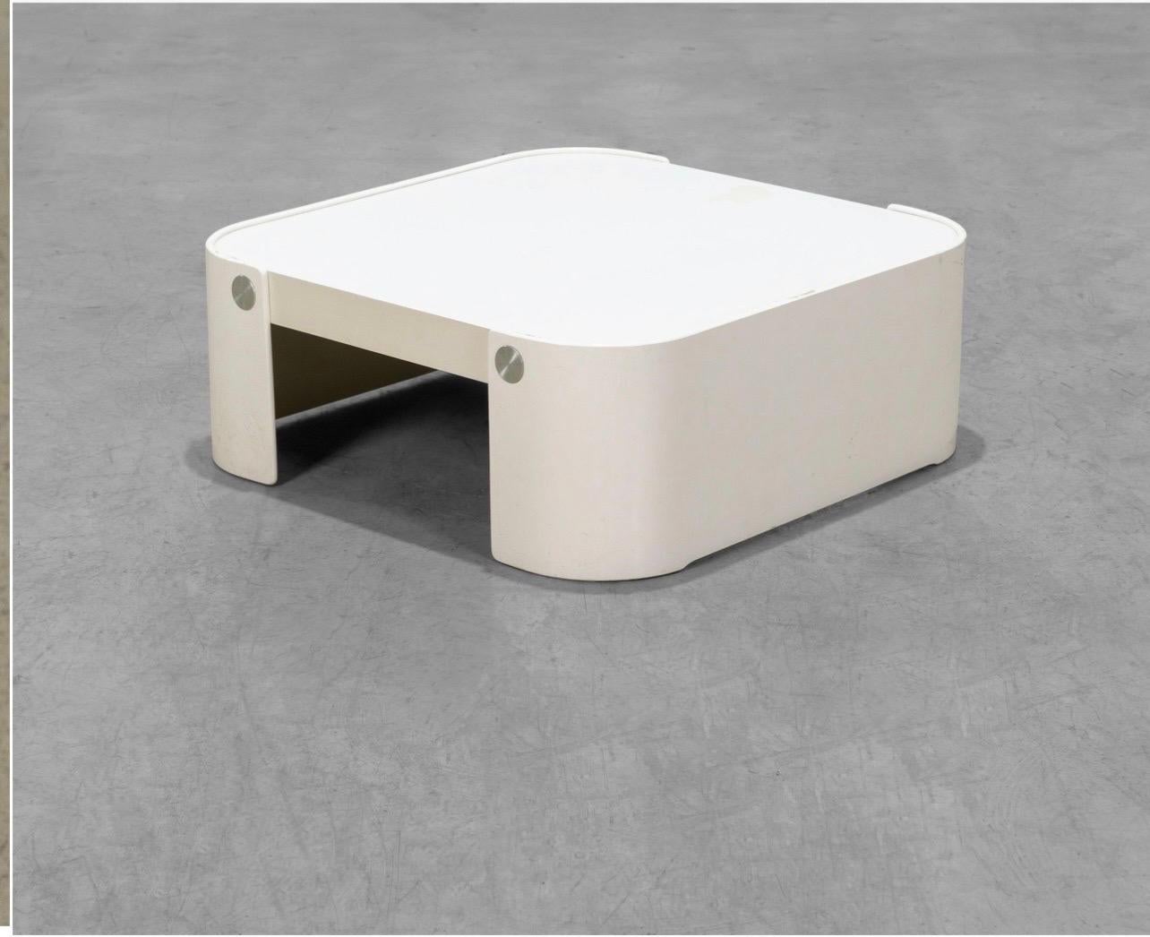 Trinom white coffee table by Peter Maly for COR. circa 1970.

Curved bentwood legs supporting a laminate top, accented with round chrome medallions.

Dimensions: 11.5” H x 30.25” L x 30.25” D.
 